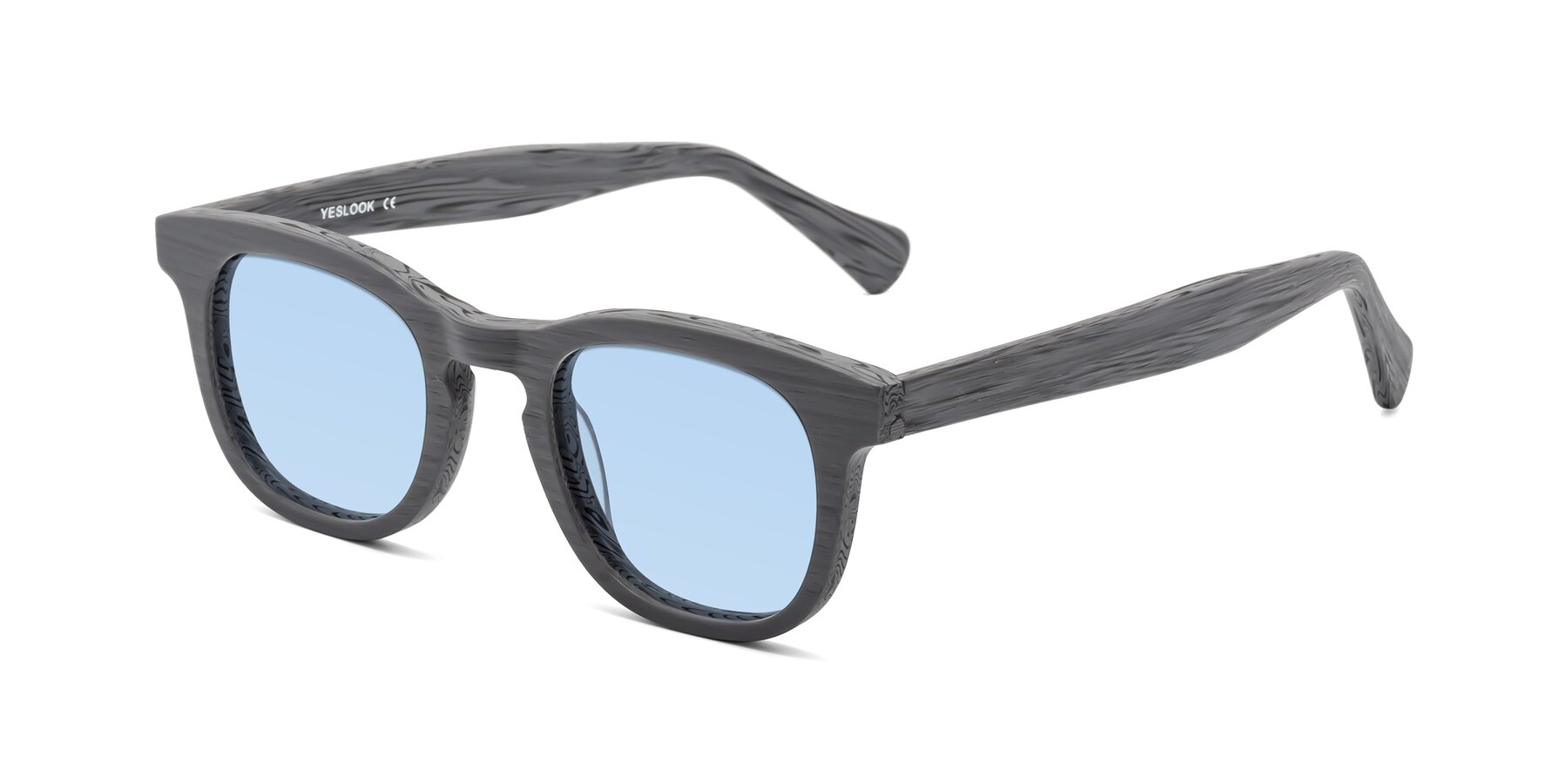 Angle of Tonia in Cement Woodgrain with Light Blue Tinted Lenses