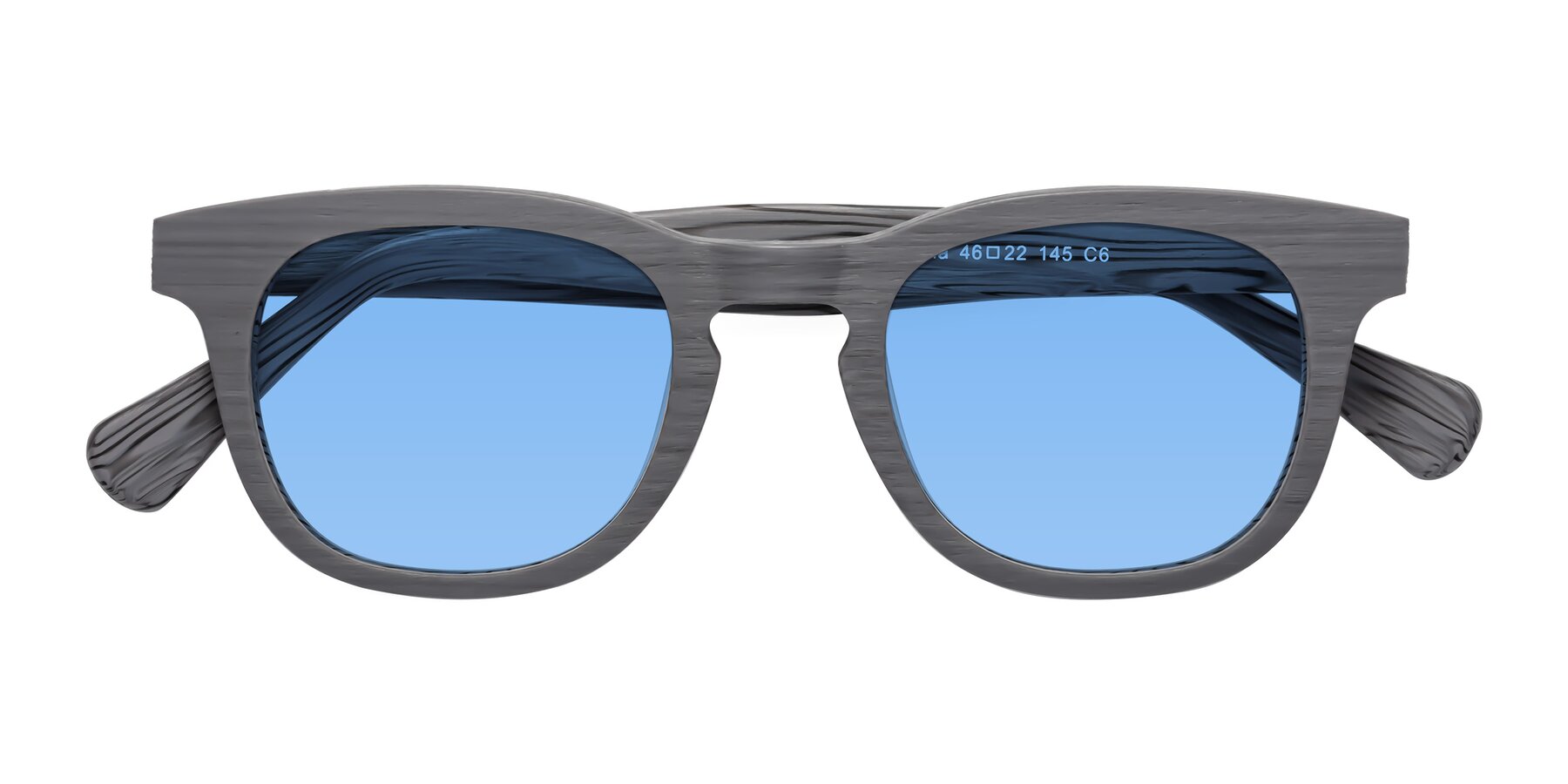 Folded Front of Tonia in Cement Woodgrain with Medium Blue Tinted Lenses