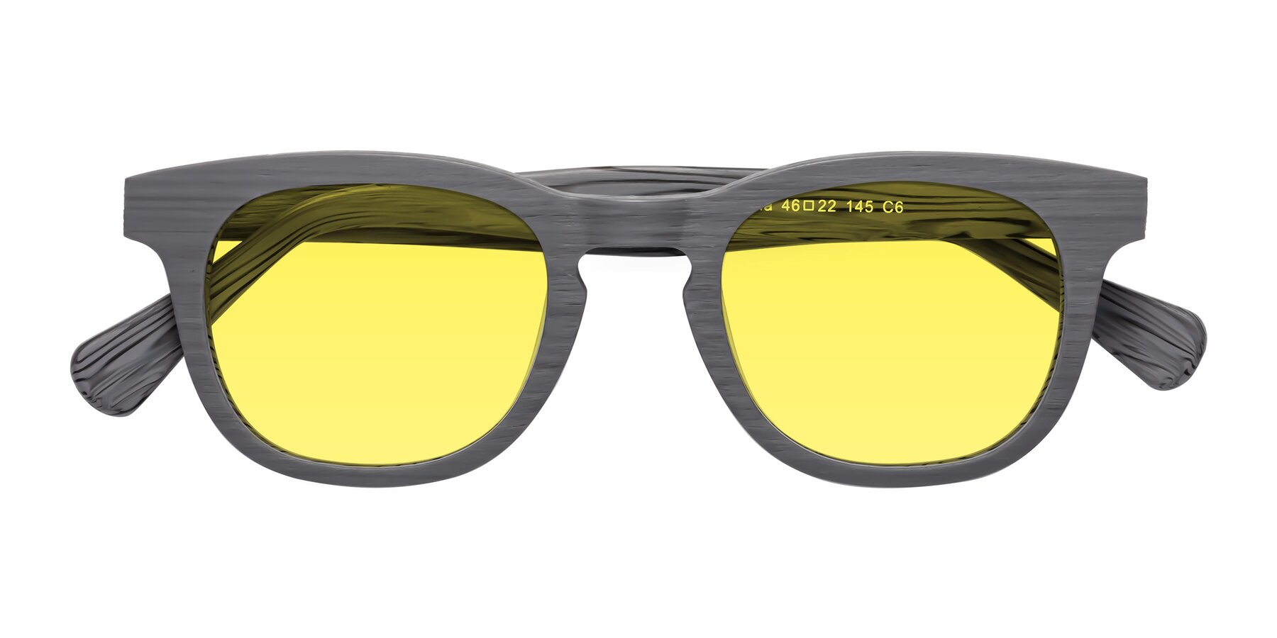 Folded Front of Tonia in Cement Woodgrain with Medium Yellow Tinted Lenses