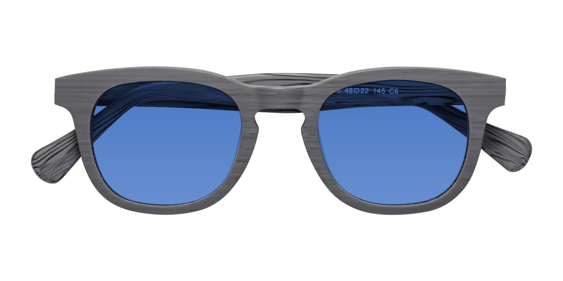 Folded Front of Tonia in Cement Woodgrain with Blue Tinted Lenses