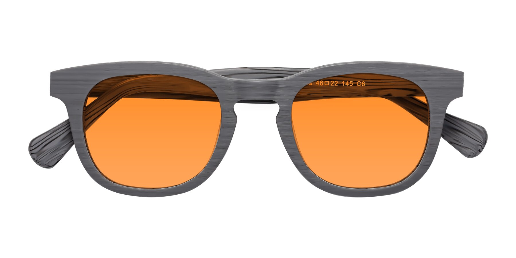 Folded Front of Tonia in Cement Woodgrain with Orange Tinted Lenses