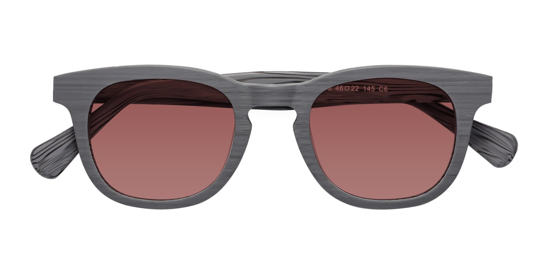 Folded Front of Tonia in Cement Woodgrain with Garnet Tinted Lenses