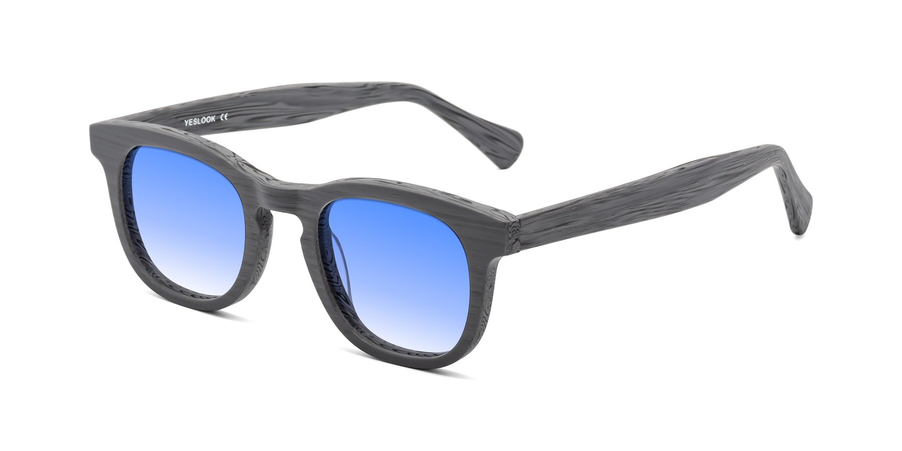 Angle of Tonia in Cement Woodgrain with Blue Gradient Lenses