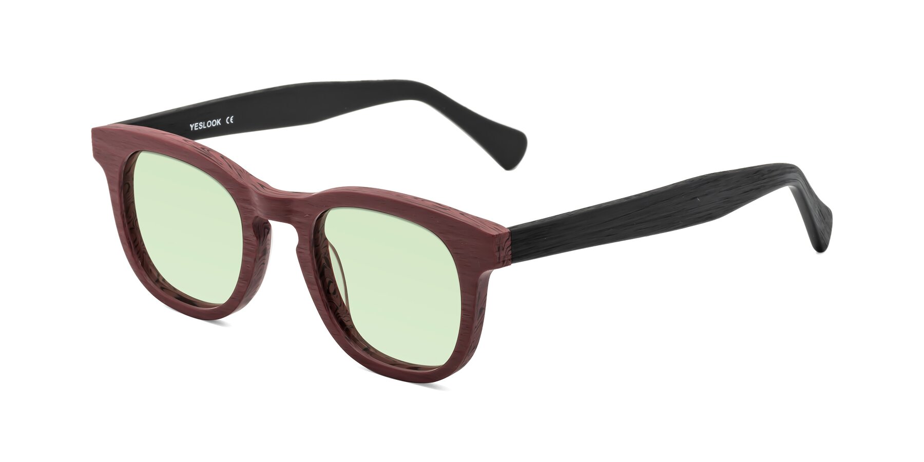 Angle of Tonia in Burgundy-Black Woodgrain with Light Green Tinted Lenses