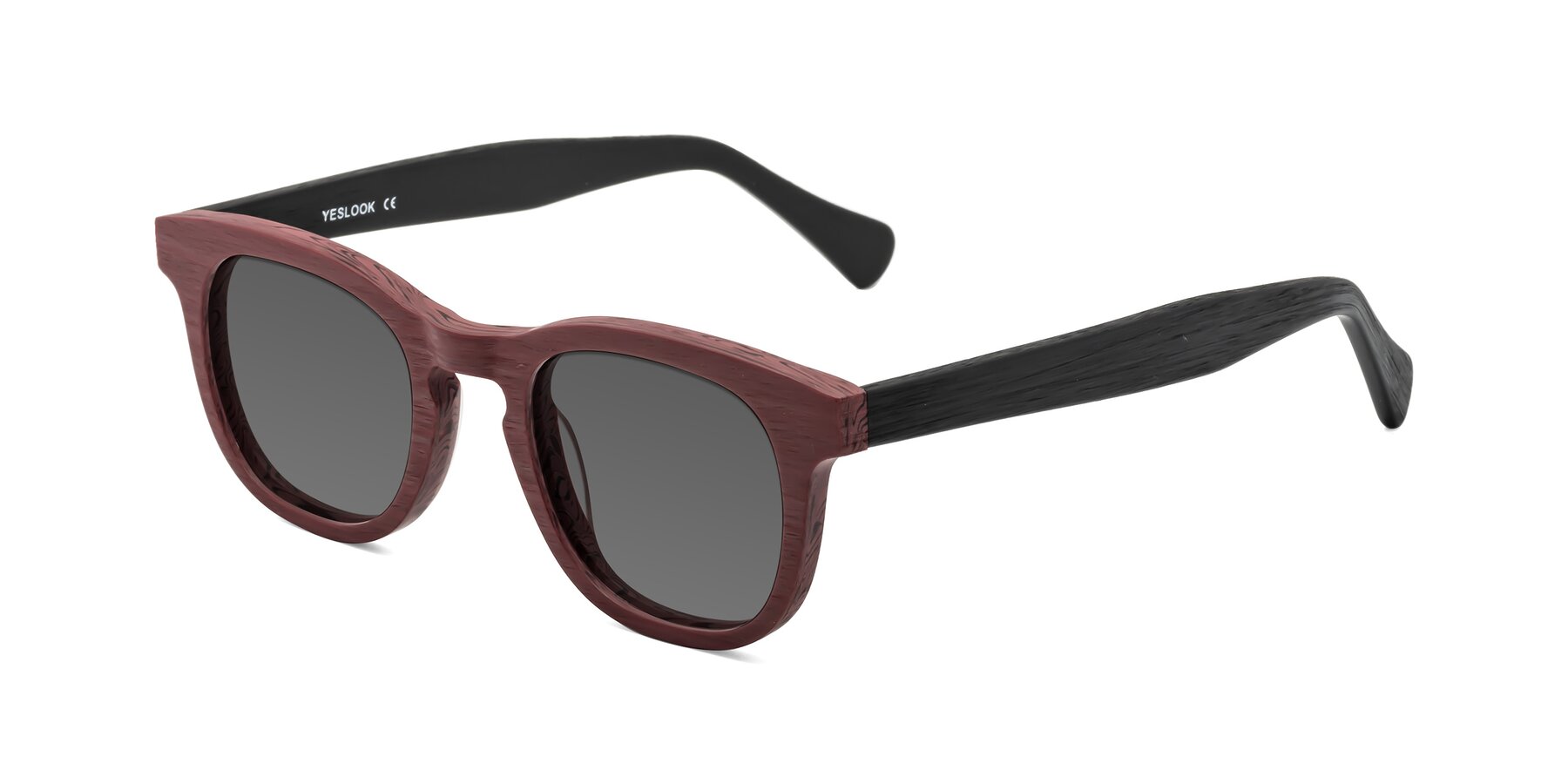 Angle of Tonia in Burgundy-Black Woodgrain with Medium Gray Tinted Lenses