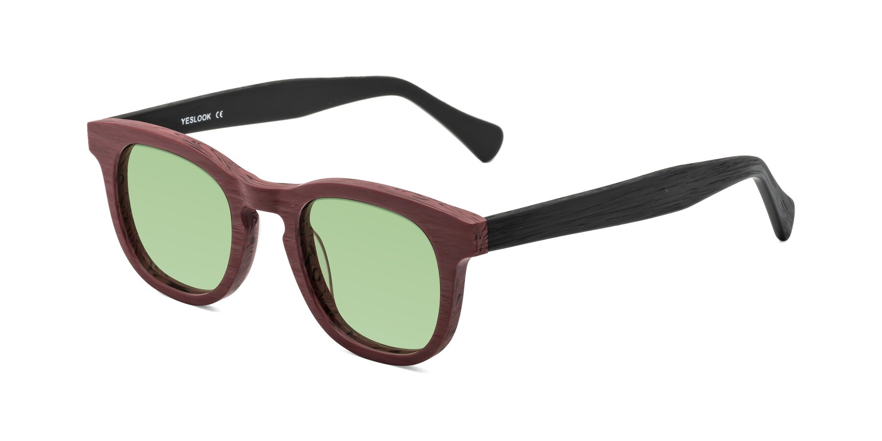 Angle of Tonia in Burgundy-Black Woodgrain with Medium Green Tinted Lenses