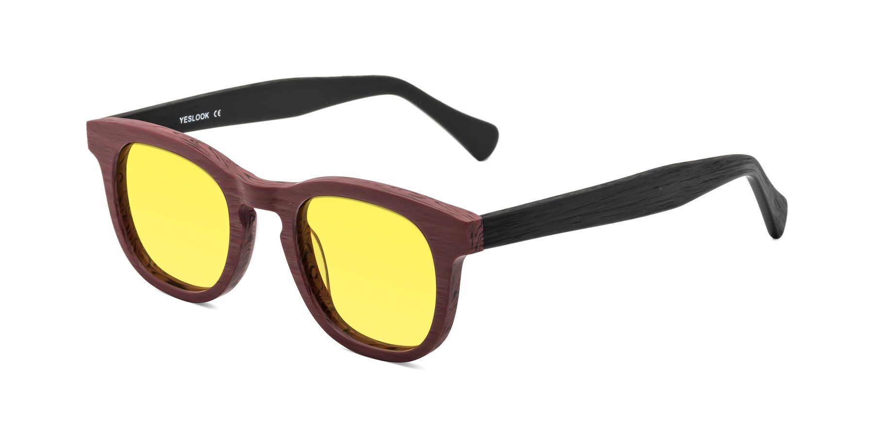 Angle of Tonia in Burgundy-Black Woodgrain with Medium Yellow Tinted Lenses