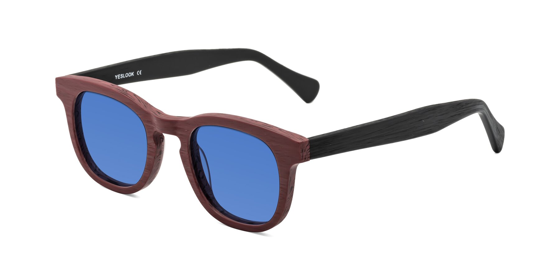 Angle of Tonia in Burgundy-Black Woodgrain with Blue Tinted Lenses