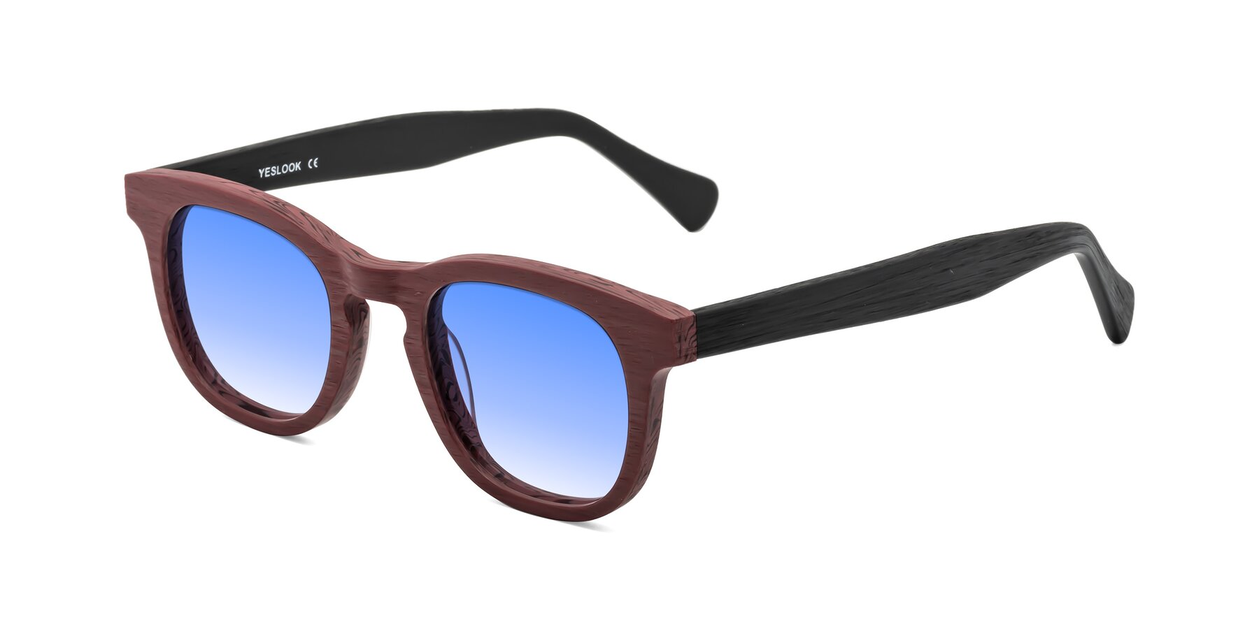 Angle of Tonia in Burgundy-Black Woodgrain with Blue Gradient Lenses