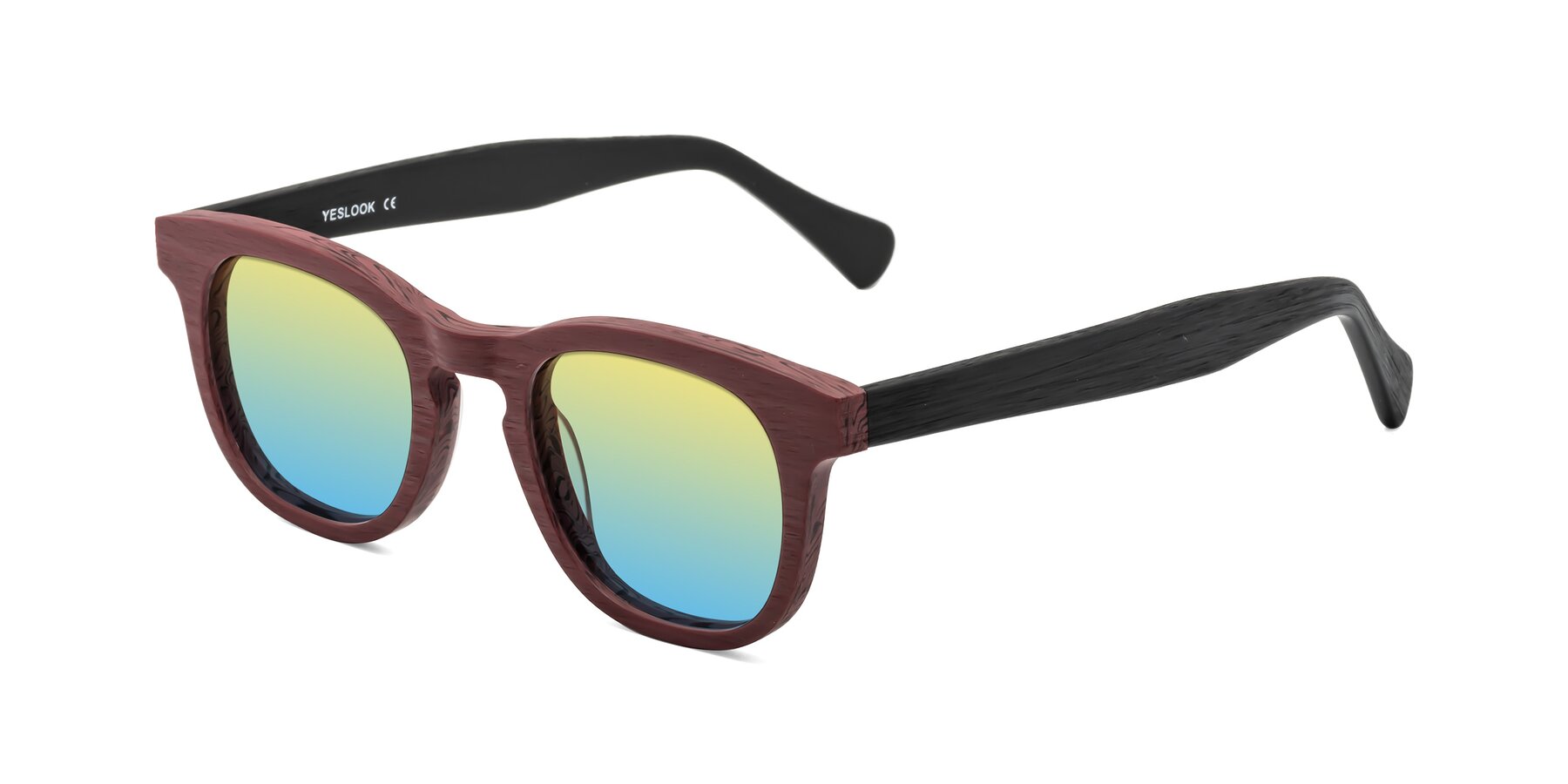 Angle of Tonia in Burgundy-Black Woodgrain with Yellow / Blue Gradient Lenses