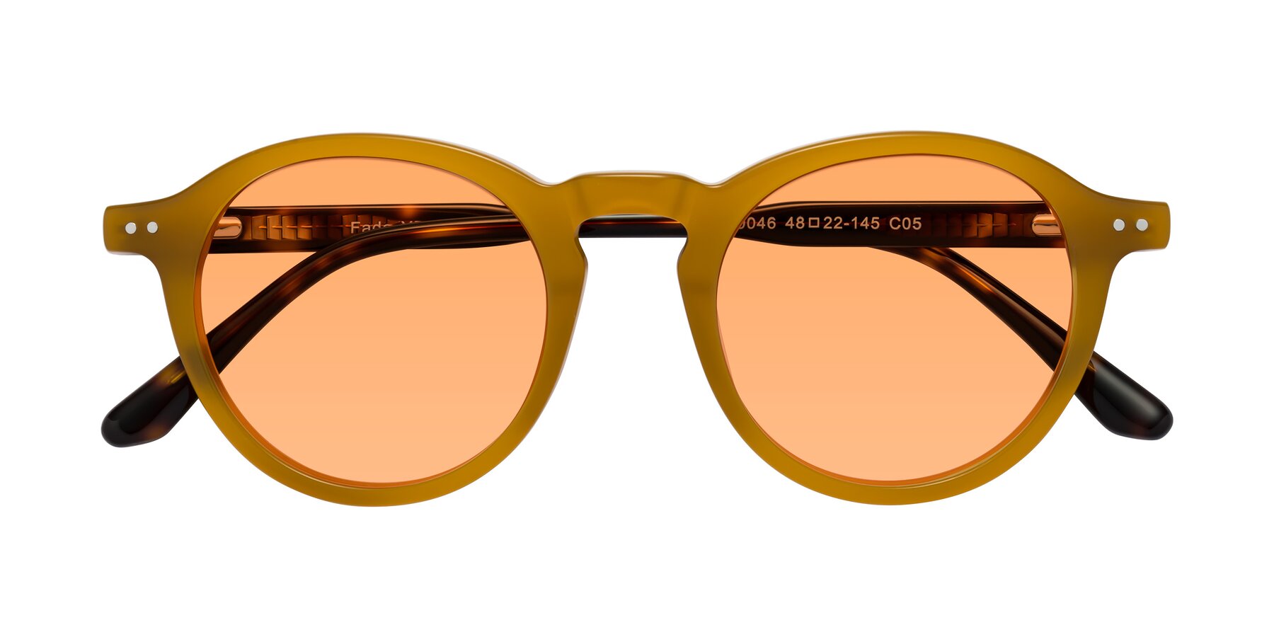 Folded Front of Fade in Caramel-Tortoise with Medium Orange Tinted Lenses