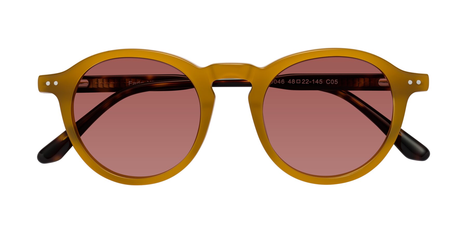 Folded Front of Fade in Caramel-Tortoise with Garnet Tinted Lenses