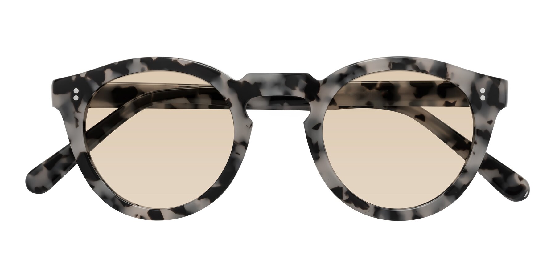 Folded Front of Annie in Ivory Tortoise with Light Brown Tinted Lenses