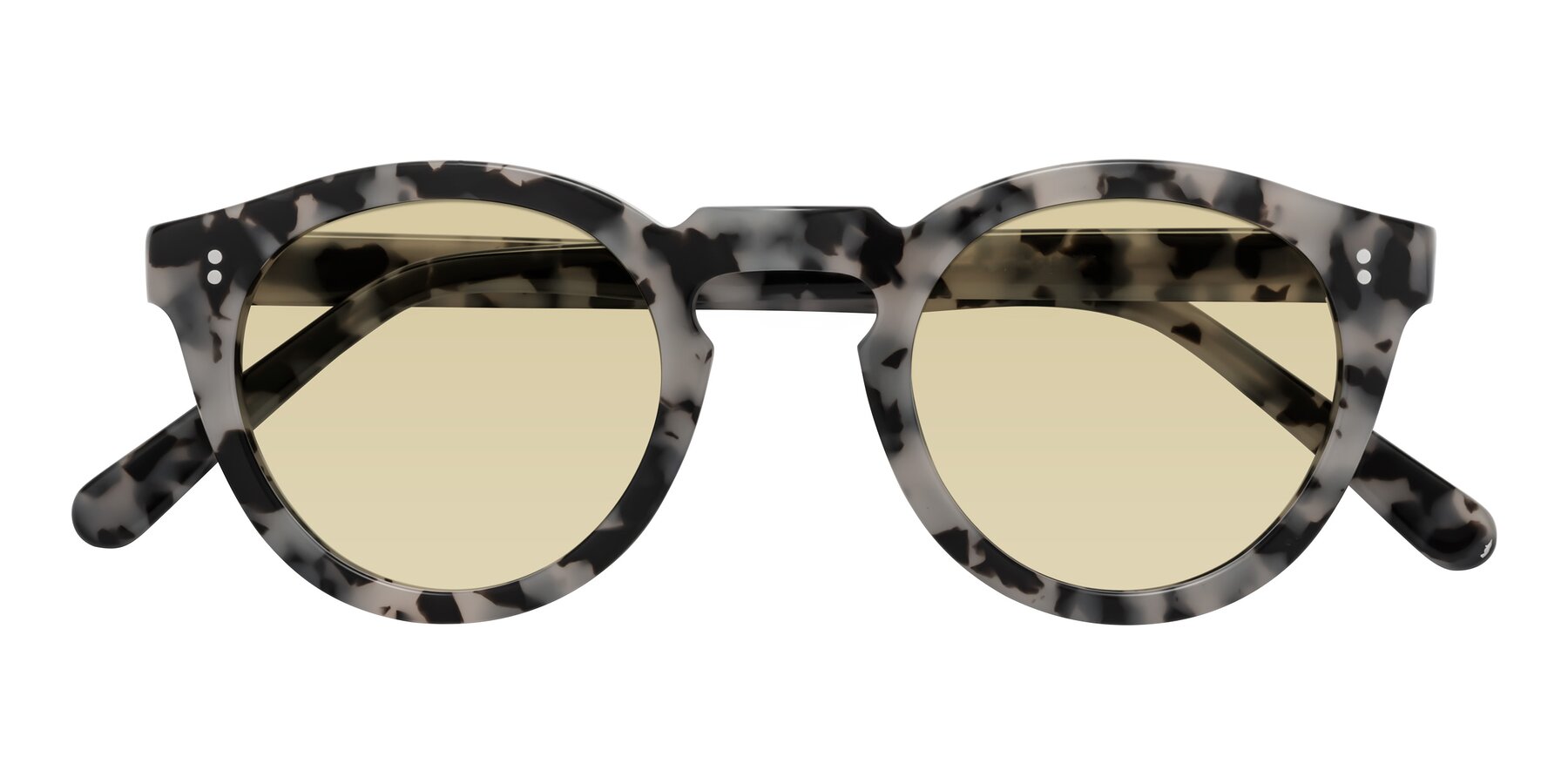 Folded Front of Annie in Ivory Tortoise with Light Champagne Tinted Lenses