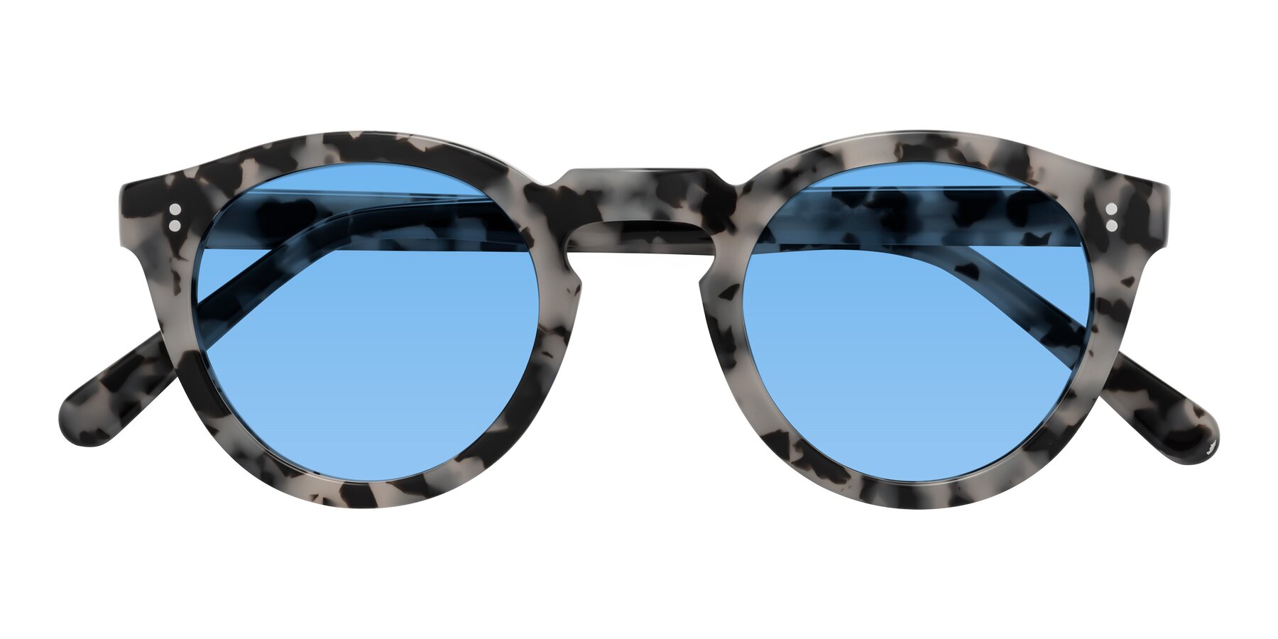 Folded Front of Annie in Ivory Tortoise with Medium Blue Tinted Lenses