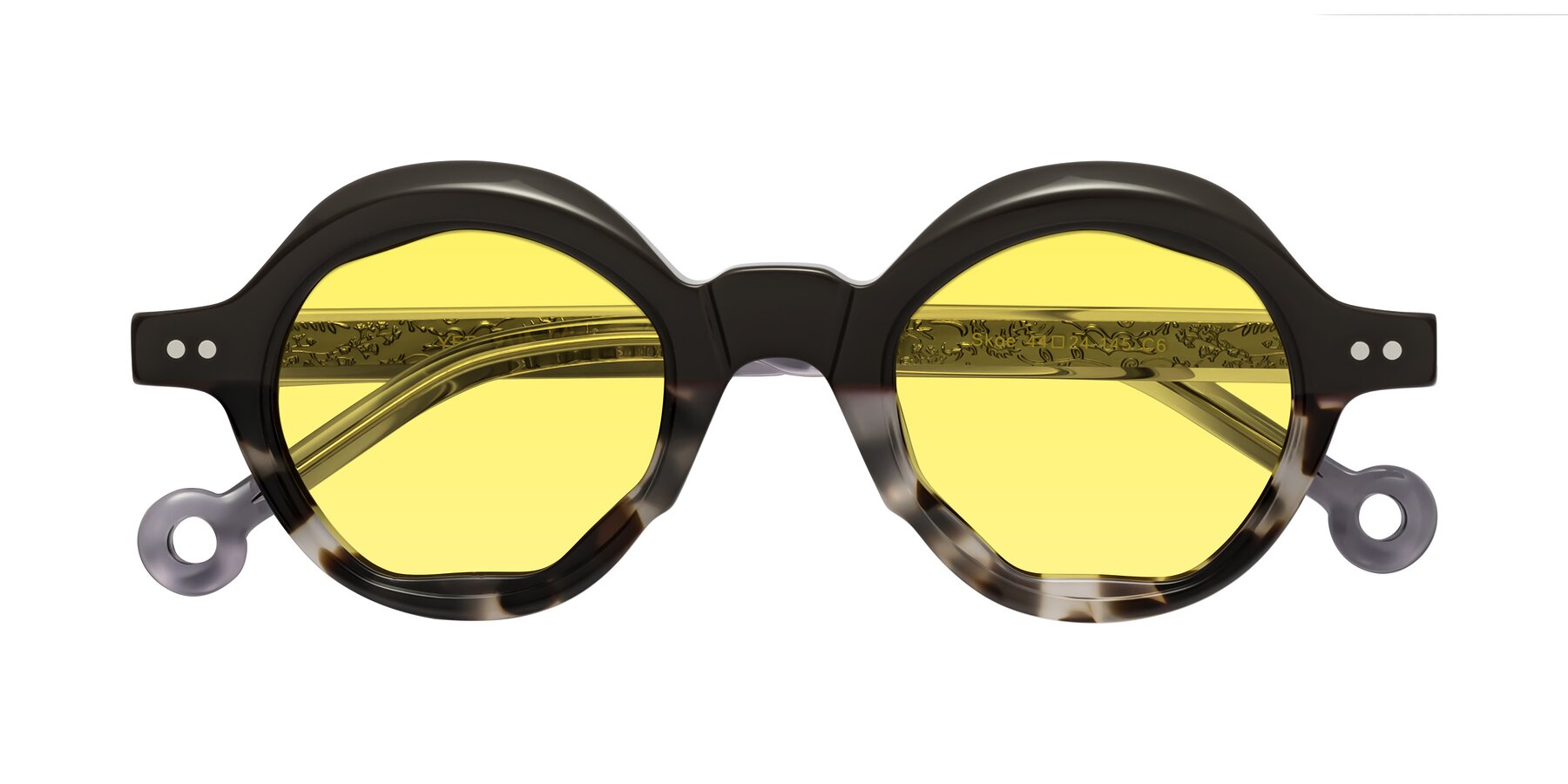 Folded Front of Skoe in Dark Gray-Ivory with Medium Yellow Tinted Lenses