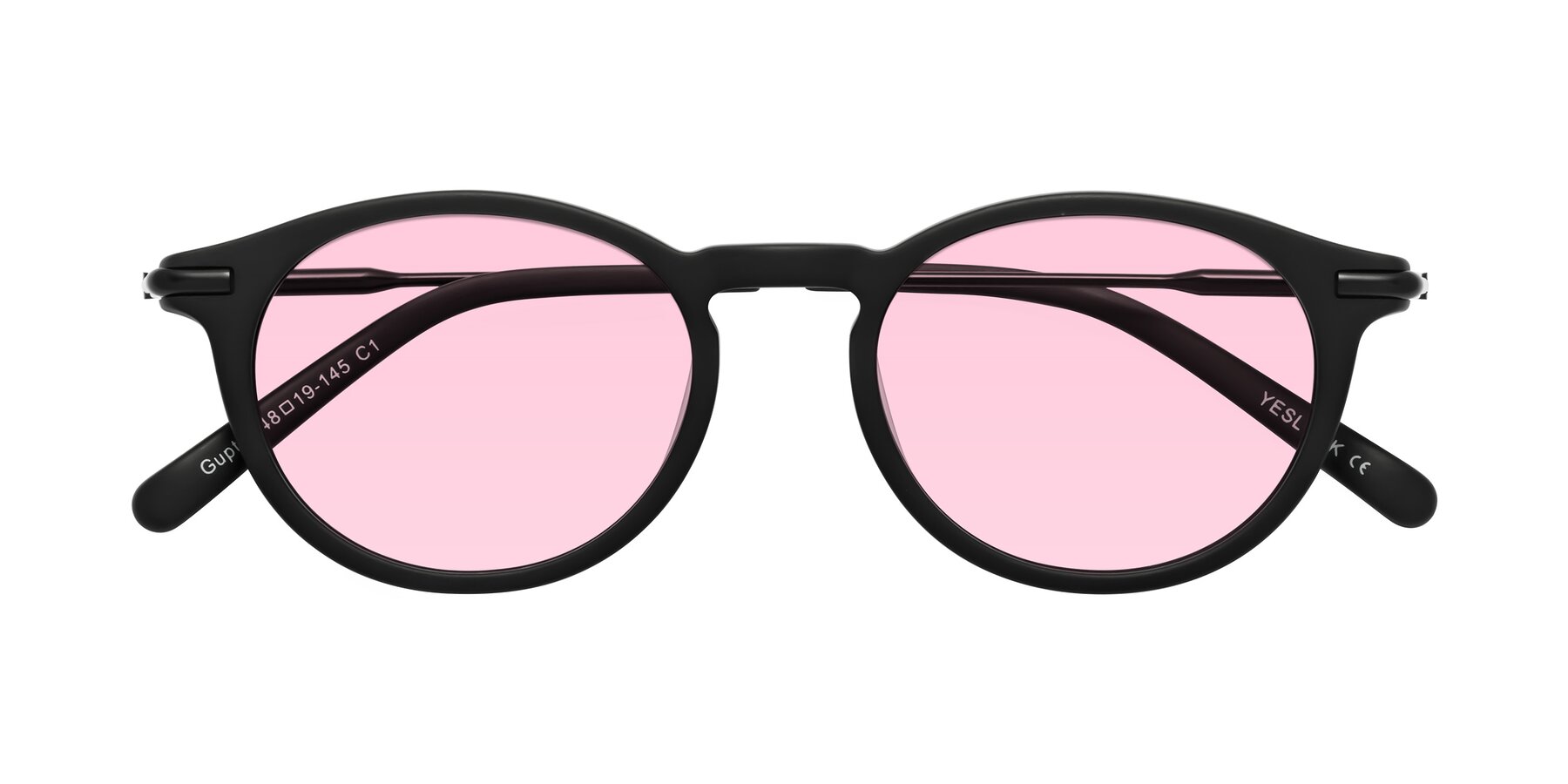 Folded Front of Gupta in Matte Black with Light Pink Tinted Lenses
