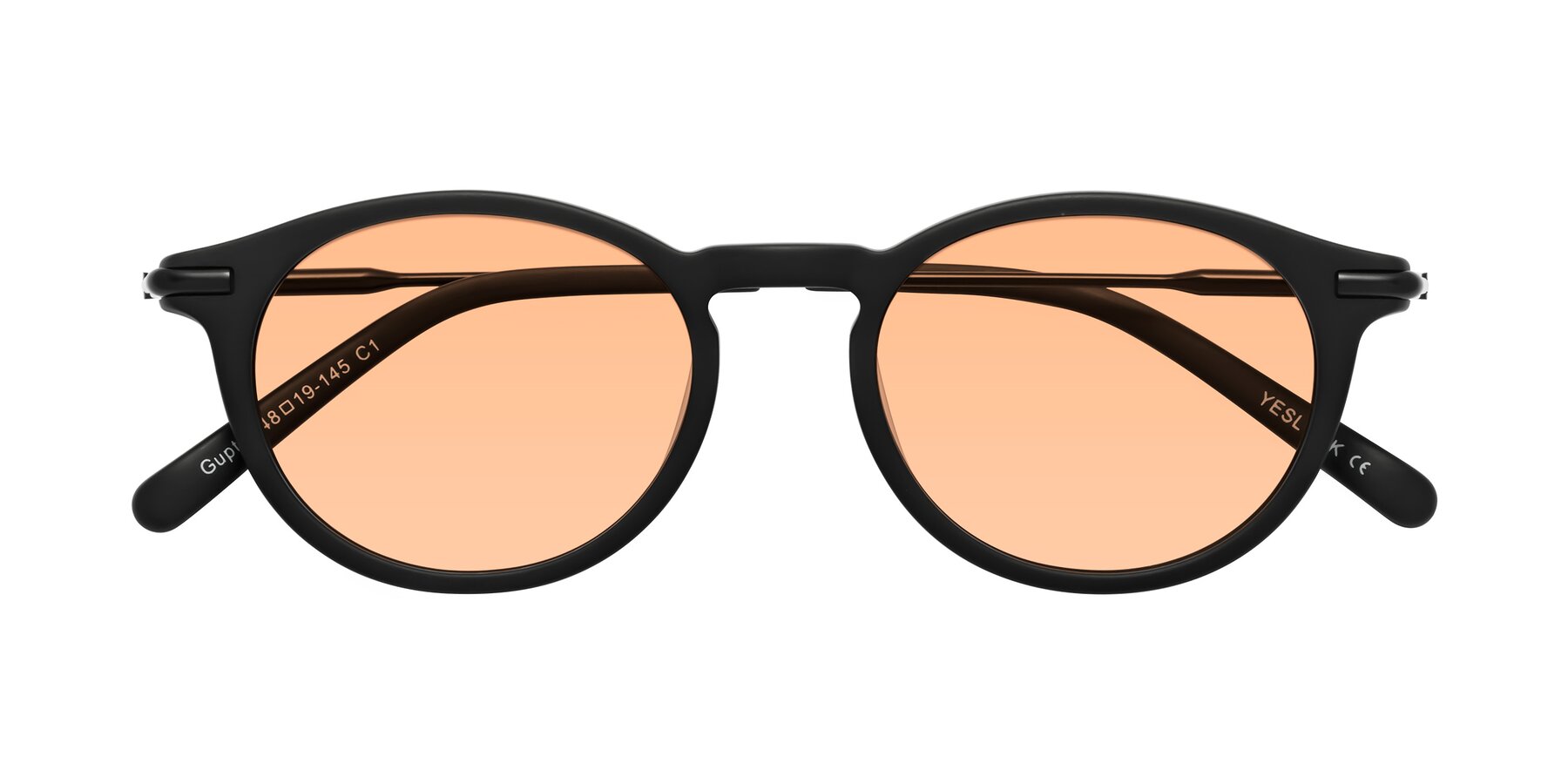 Folded Front of Gupta in Matte Black with Light Orange Tinted Lenses