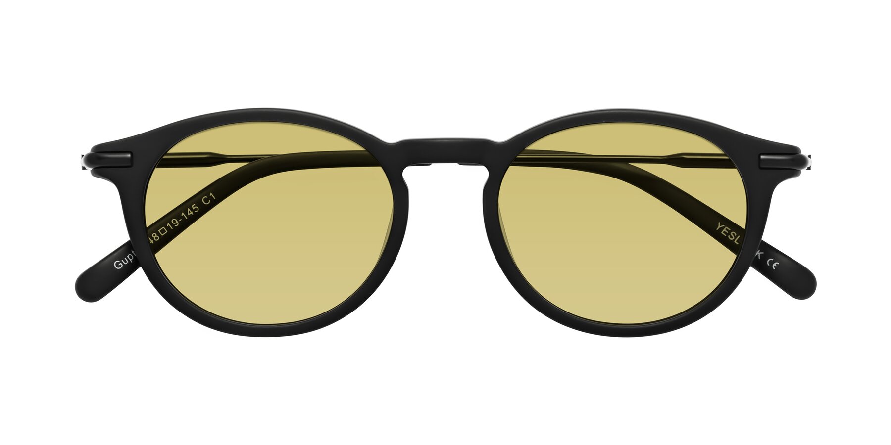 Folded Front of Gupta in Matte Black with Medium Champagne Tinted Lenses