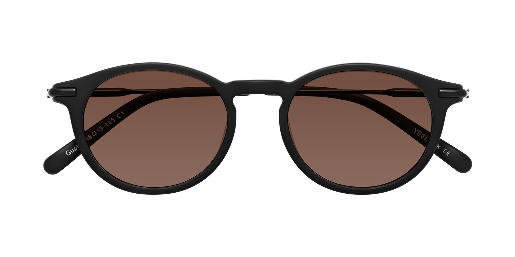 Folded Front of Gupta in Matte Black with Brown Tinted Lenses
