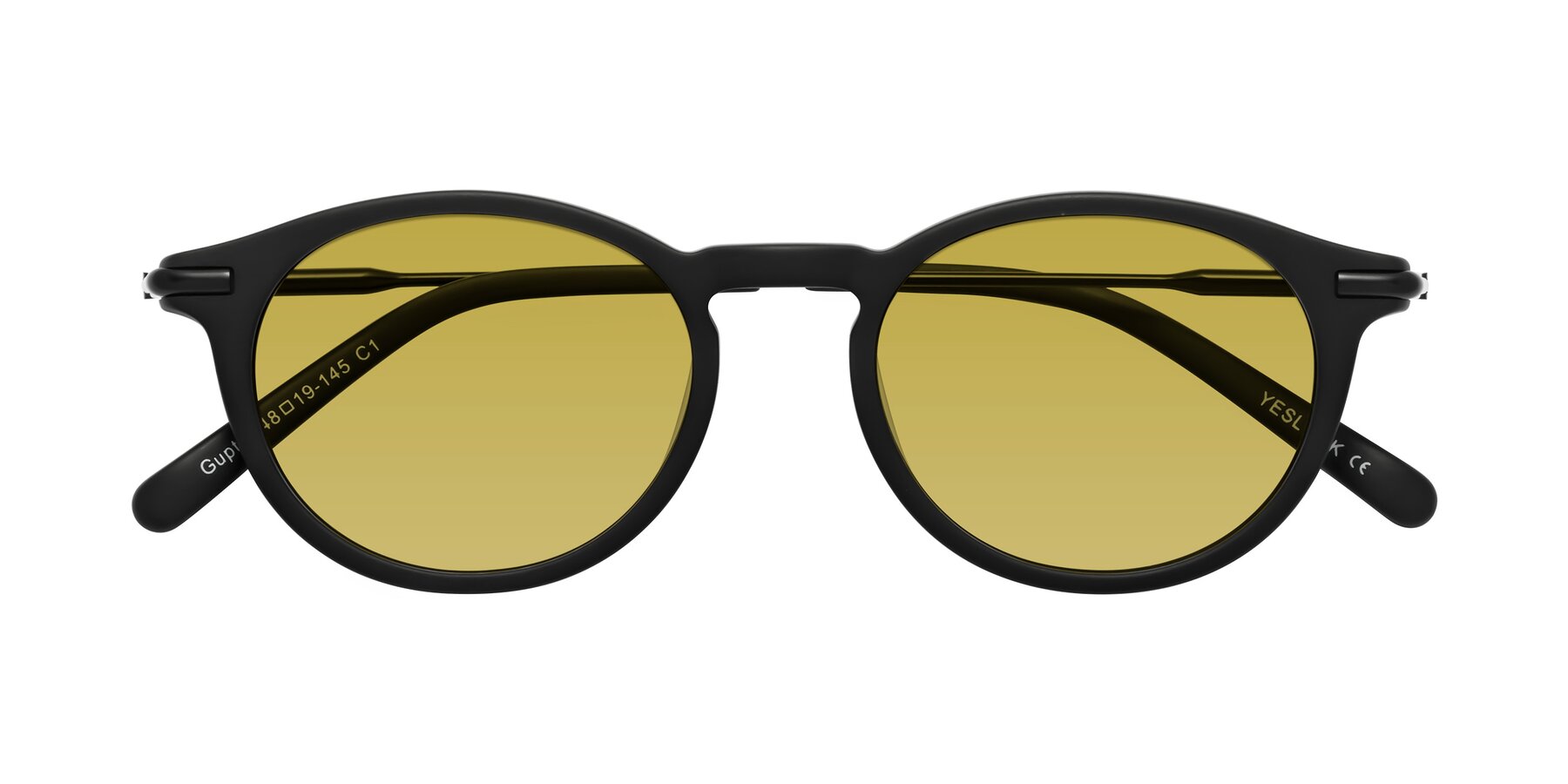 Folded Front of Gupta in Matte Black with Champagne Tinted Lenses