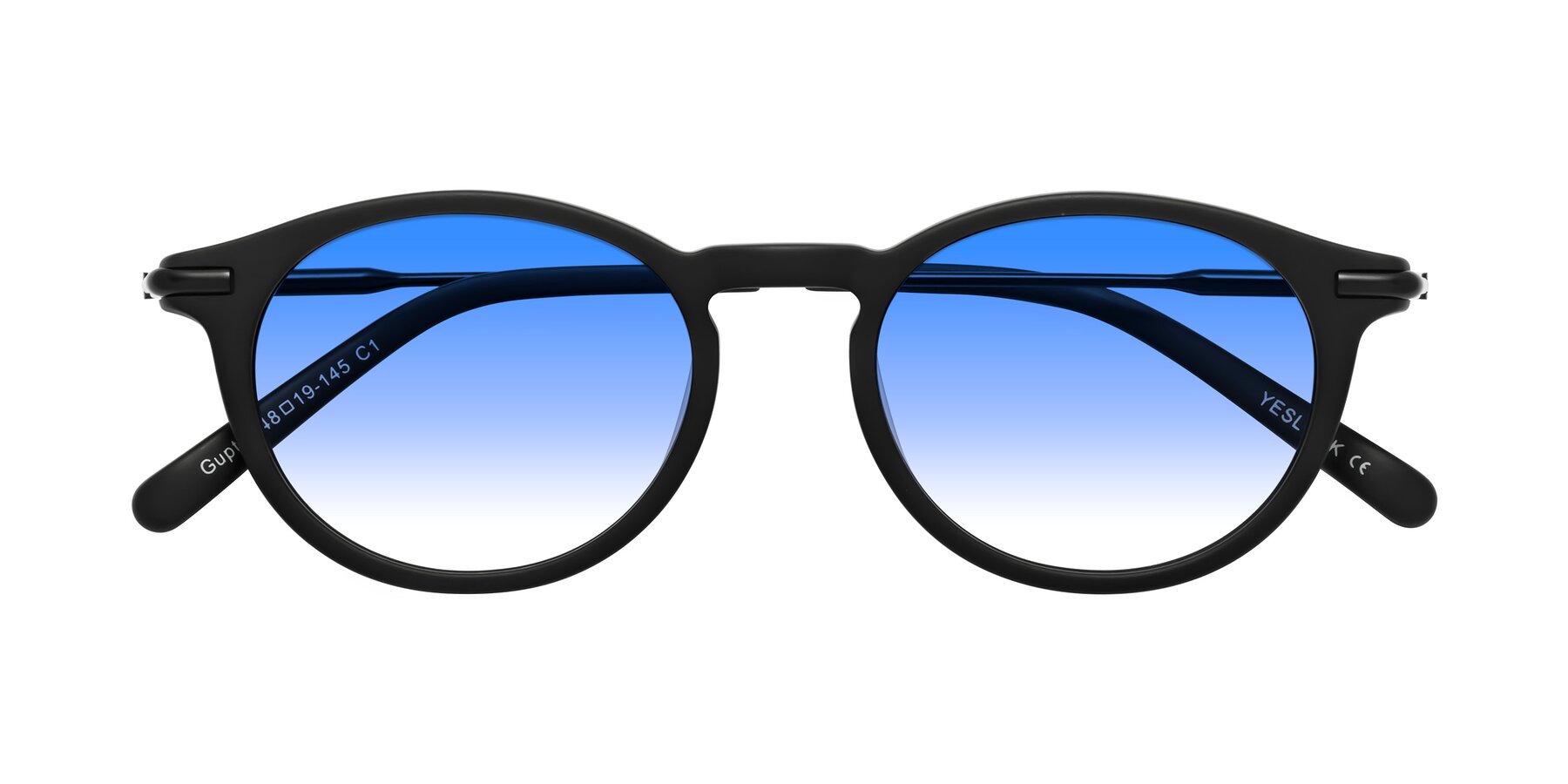 Folded Front of Gupta in Matte Black with Blue Gradient Lenses