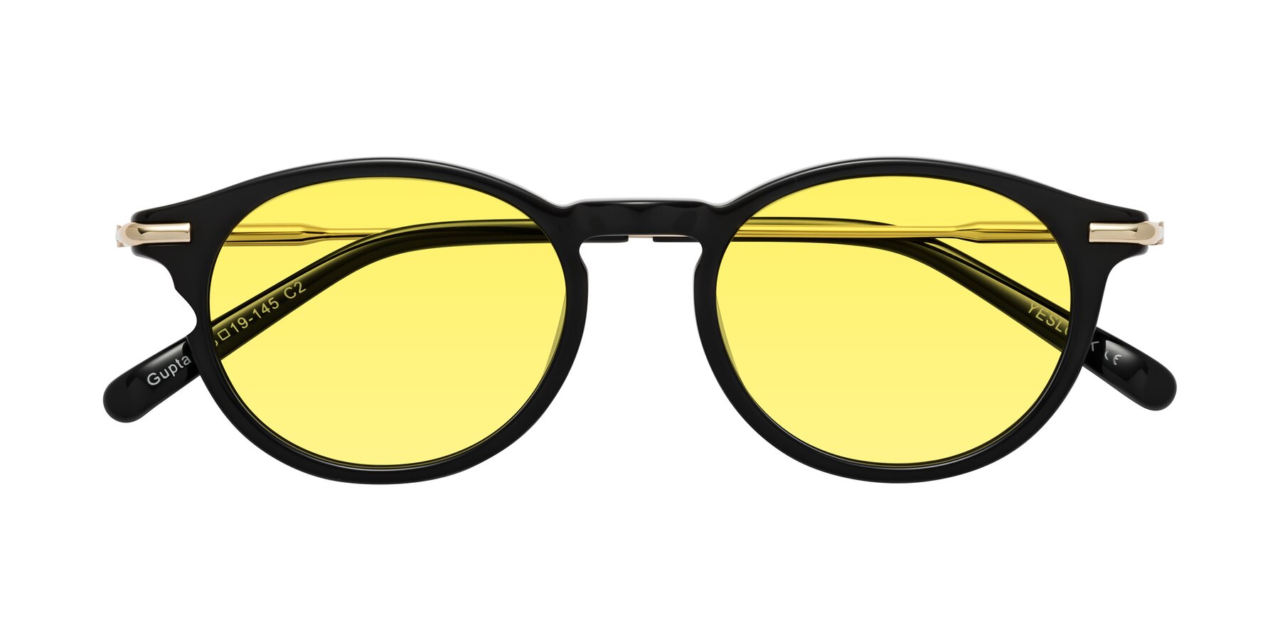 Folded Front of Gupta in Black with Medium Yellow Tinted Lenses