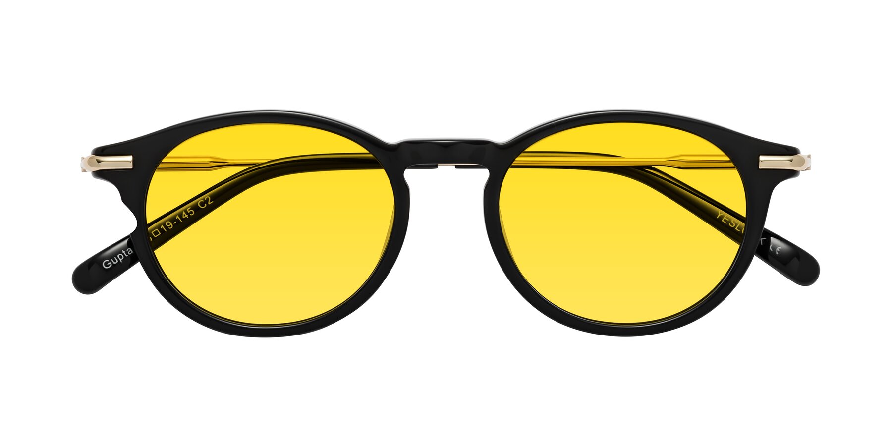 Folded Front of Gupta in Black with Yellow Tinted Lenses