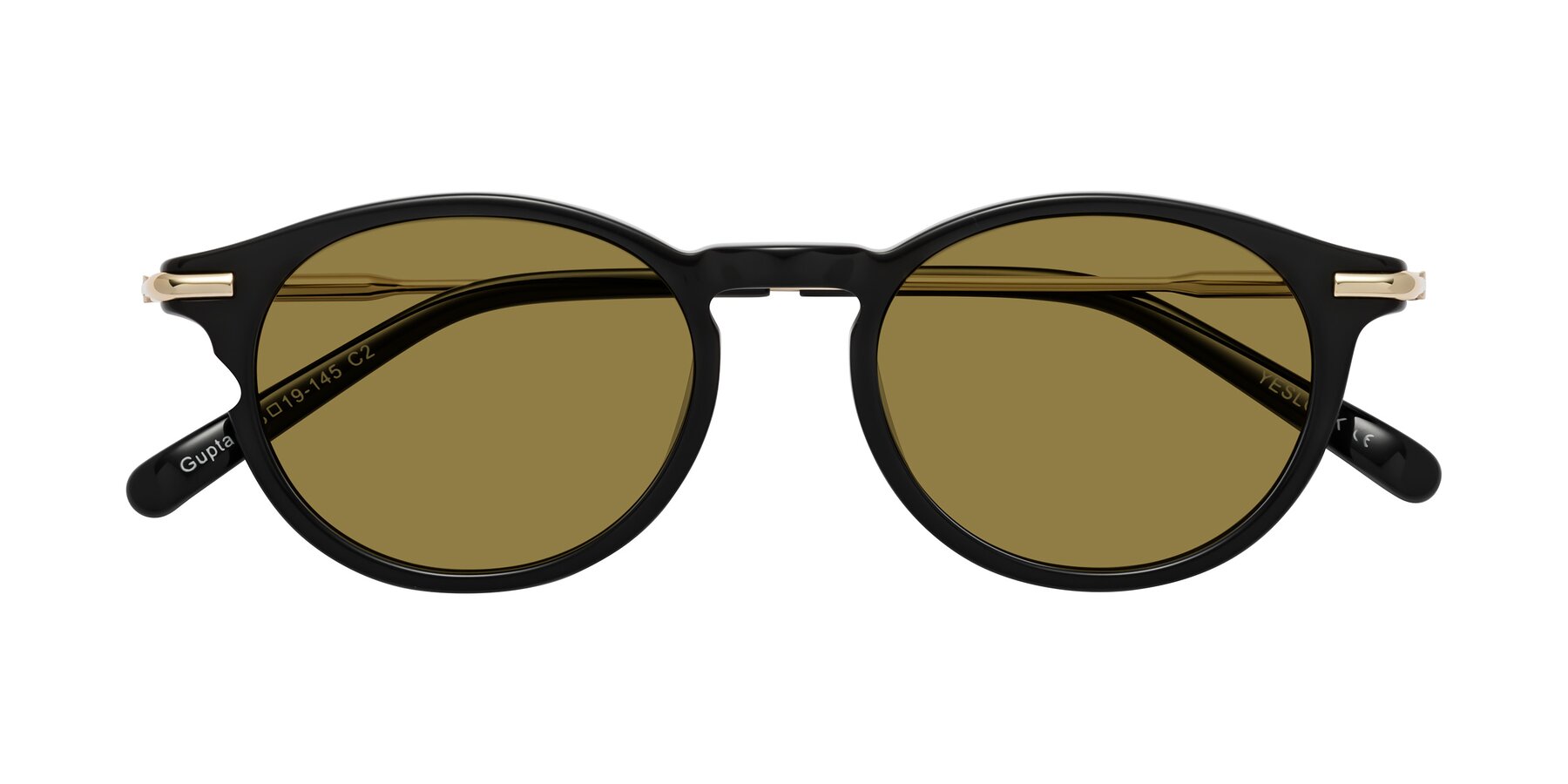 Folded Front of Gupta in Black with Brown Polarized Lenses