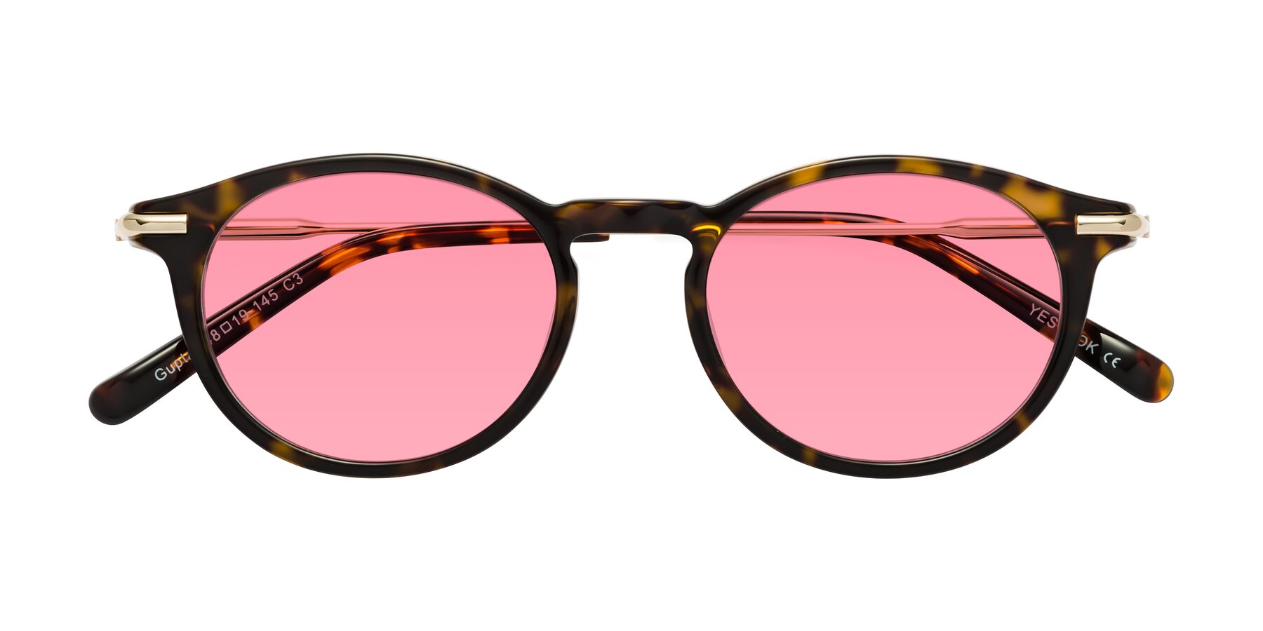 Folded Front of Gupta in Tortoise with Pink Tinted Lenses