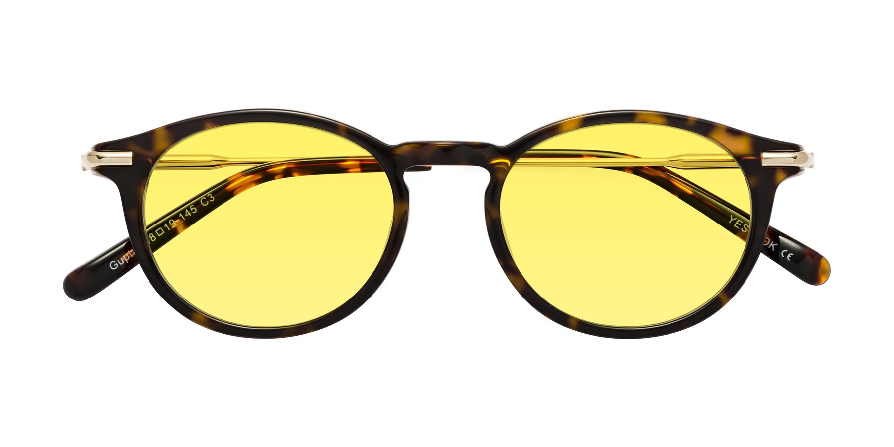 Folded Front of Gupta in Tortoise with Medium Yellow Tinted Lenses