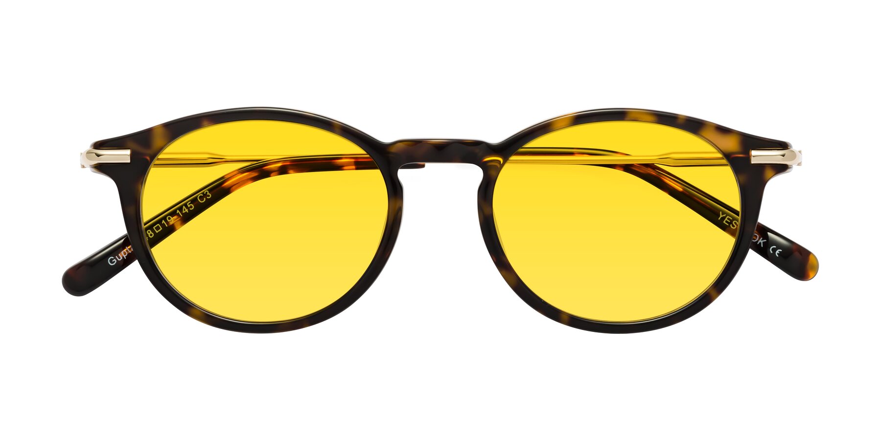 Folded Front of Gupta in Tortoise with Yellow Tinted Lenses