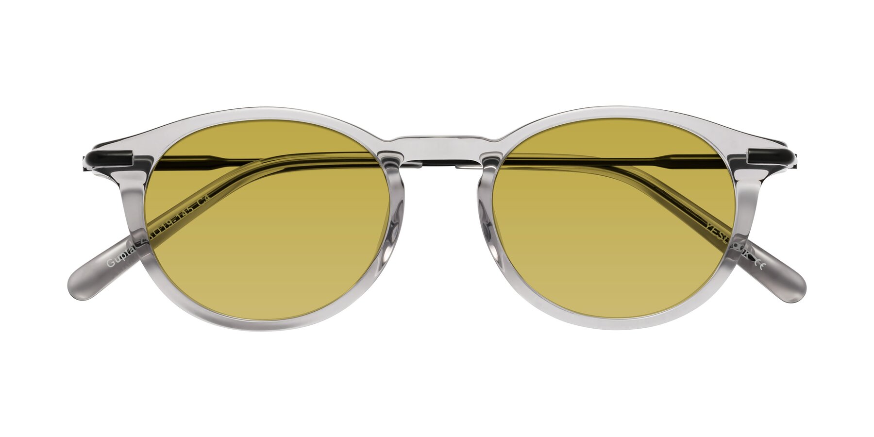 Folded Front of Gupta in Transparent Gray with Champagne Tinted Lenses