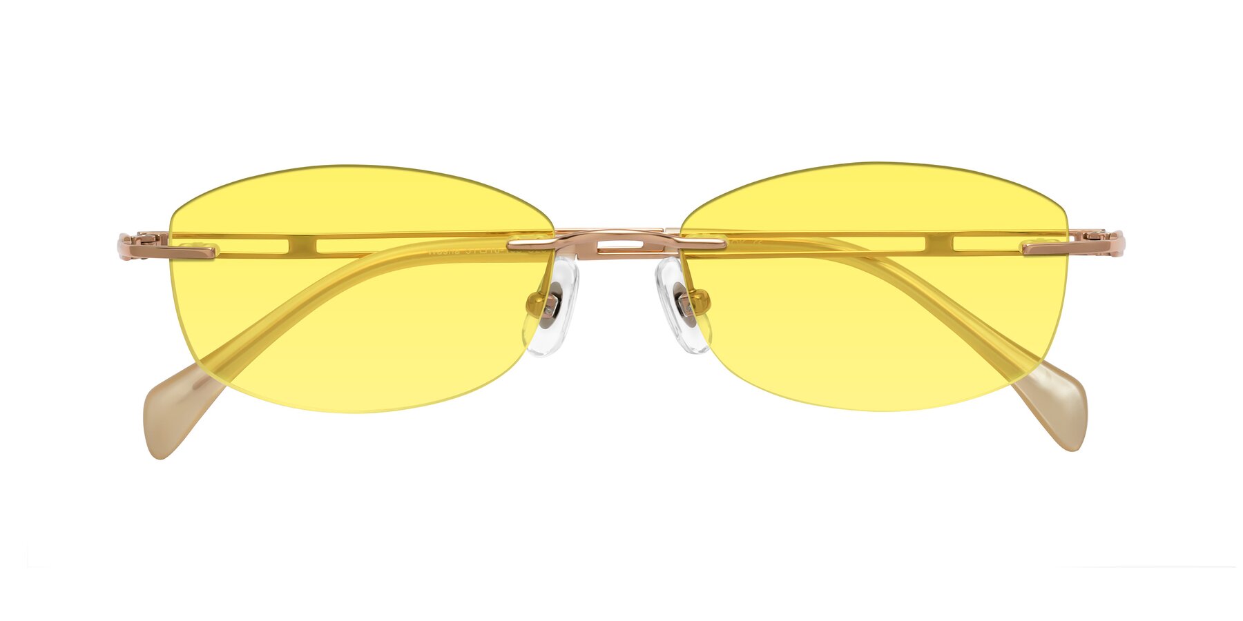 Folded Front of Washa in Rose Gold with Medium Yellow Tinted Lenses