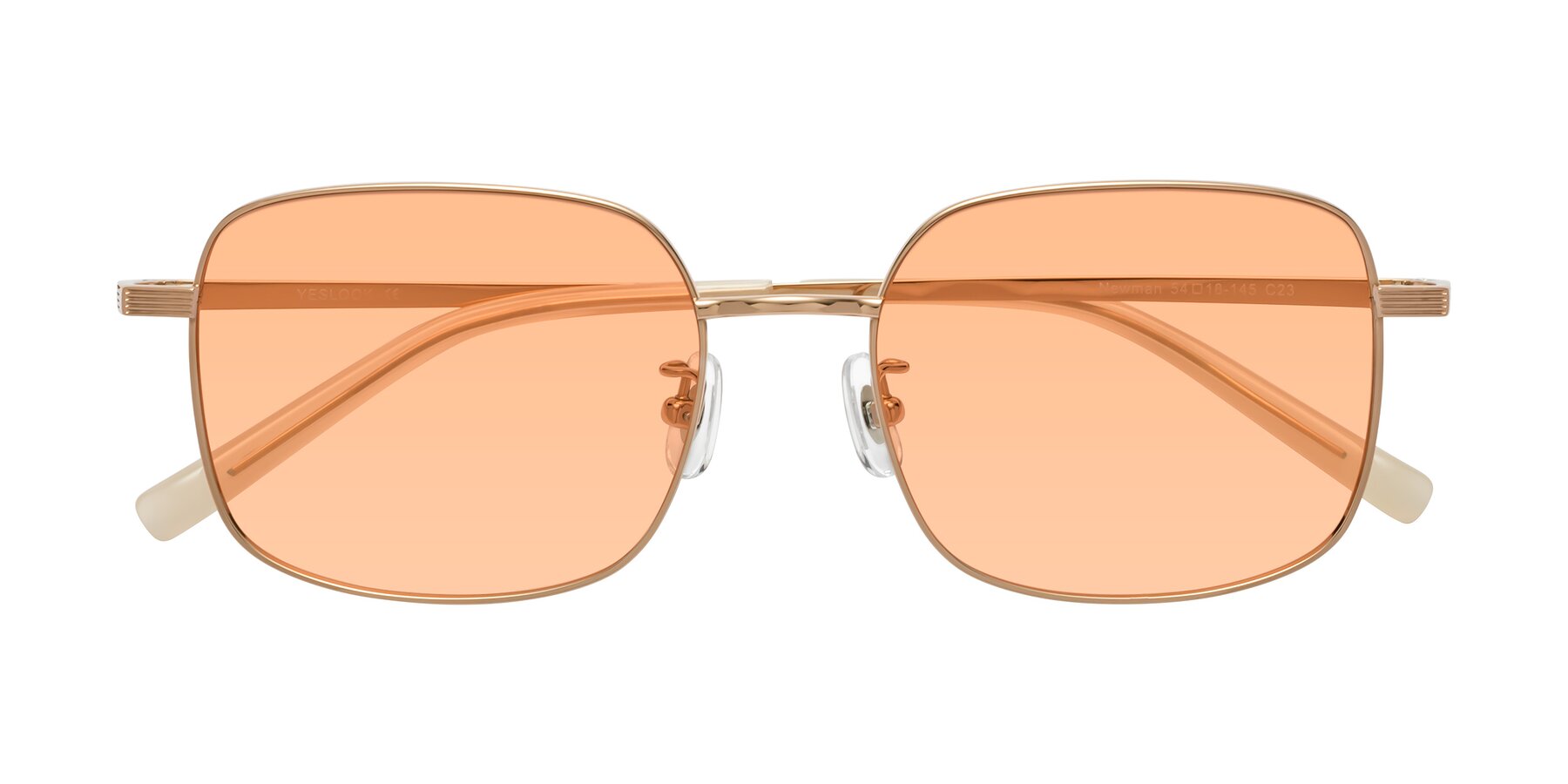 Folded Front of Newman in Rose Gold with Light Orange Tinted Lenses