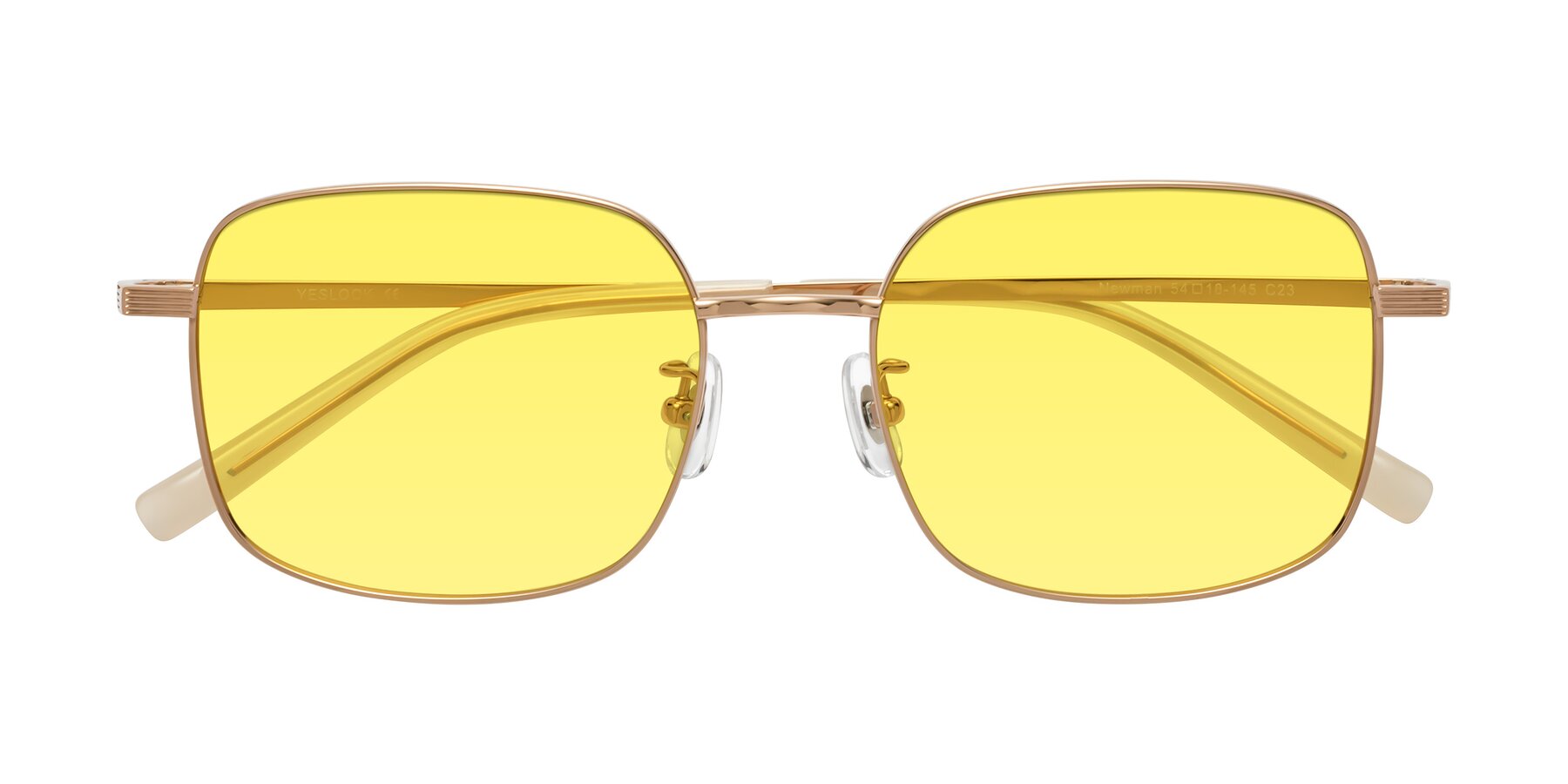 Folded Front of Newman in Rose Gold with Medium Yellow Tinted Lenses