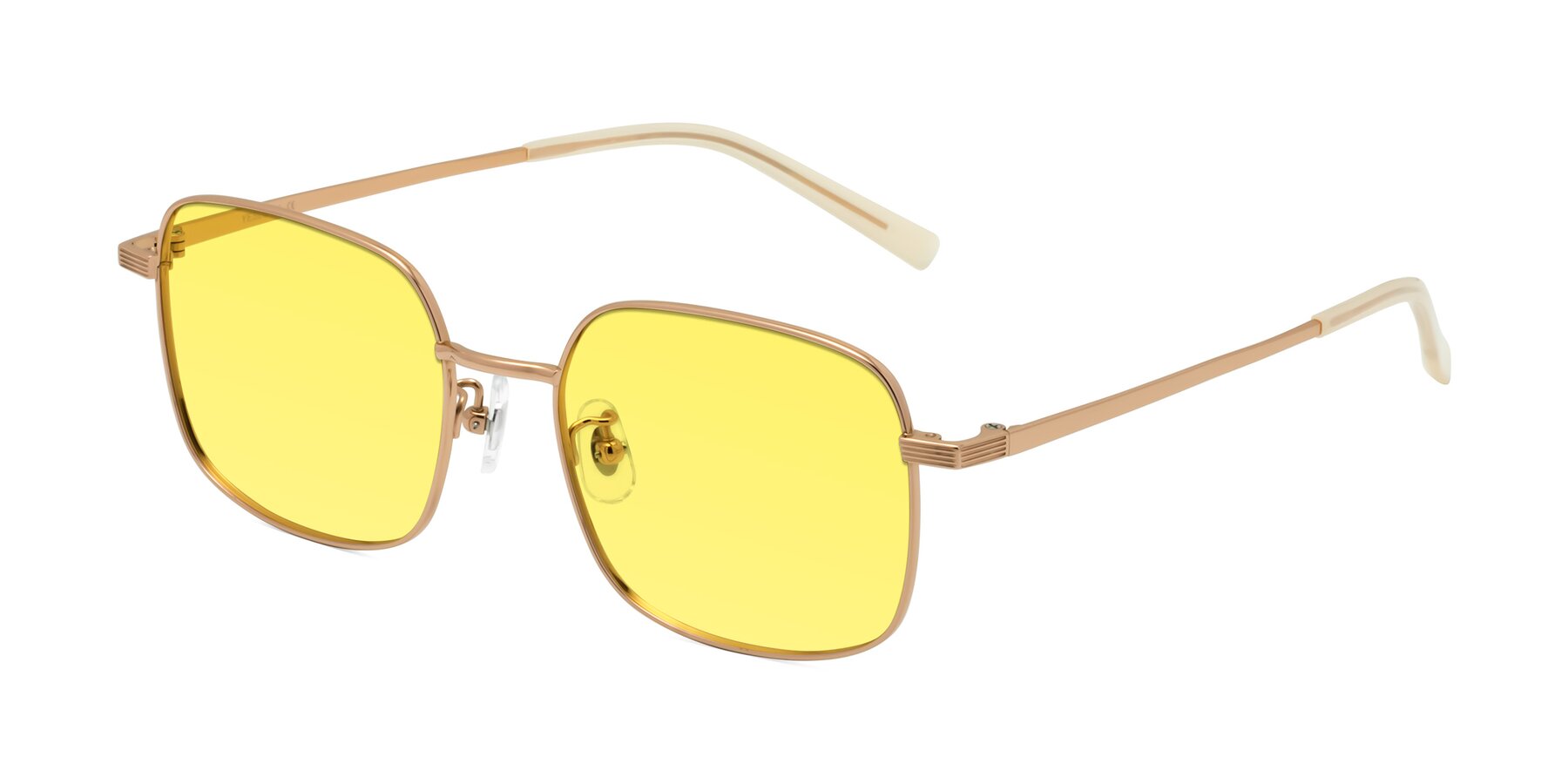 Angle of Newman in Rose Gold with Medium Yellow Tinted Lenses