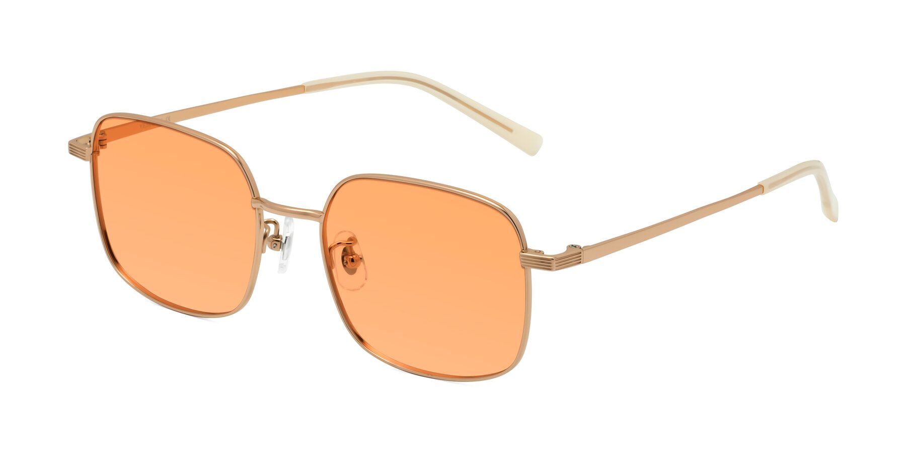 Angle of Newman in Rose Gold with Medium Orange Tinted Lenses