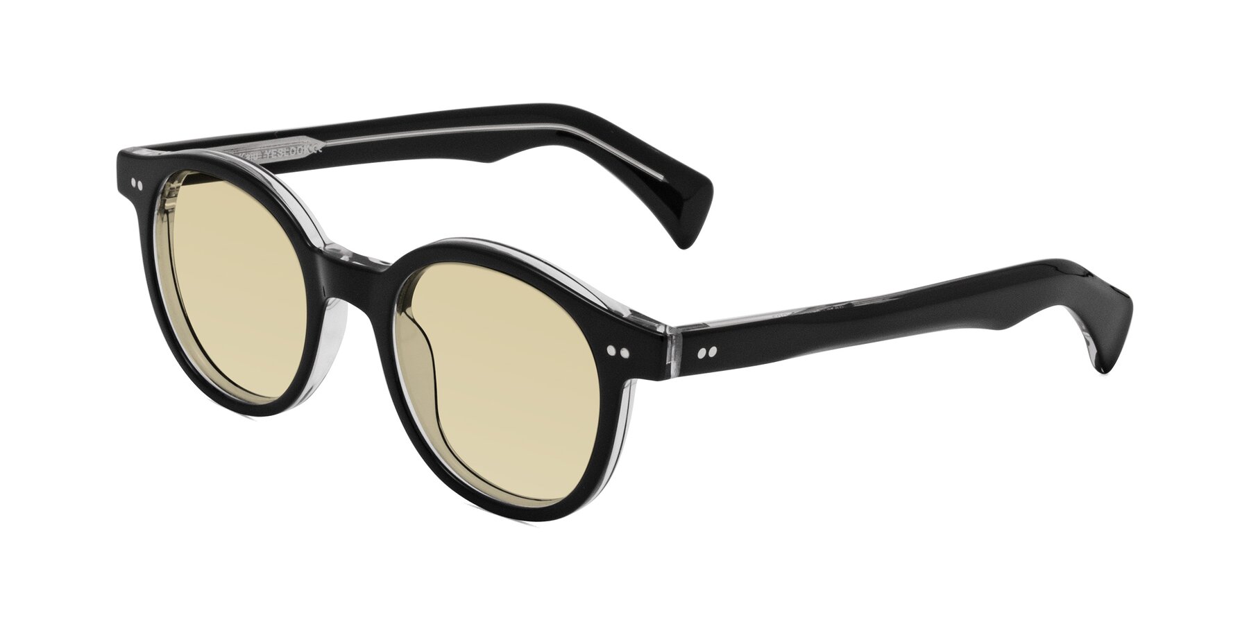 Angle of Kaju in Black/Clear with Light Champagne Tinted Lenses