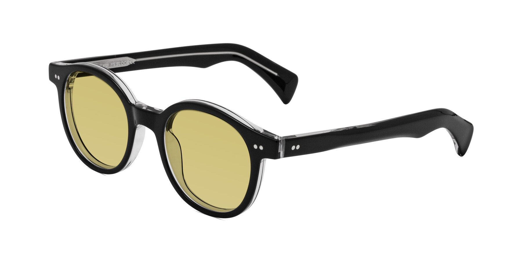 Angle of Kaju in Black/Clear with Medium Champagne Tinted Lenses