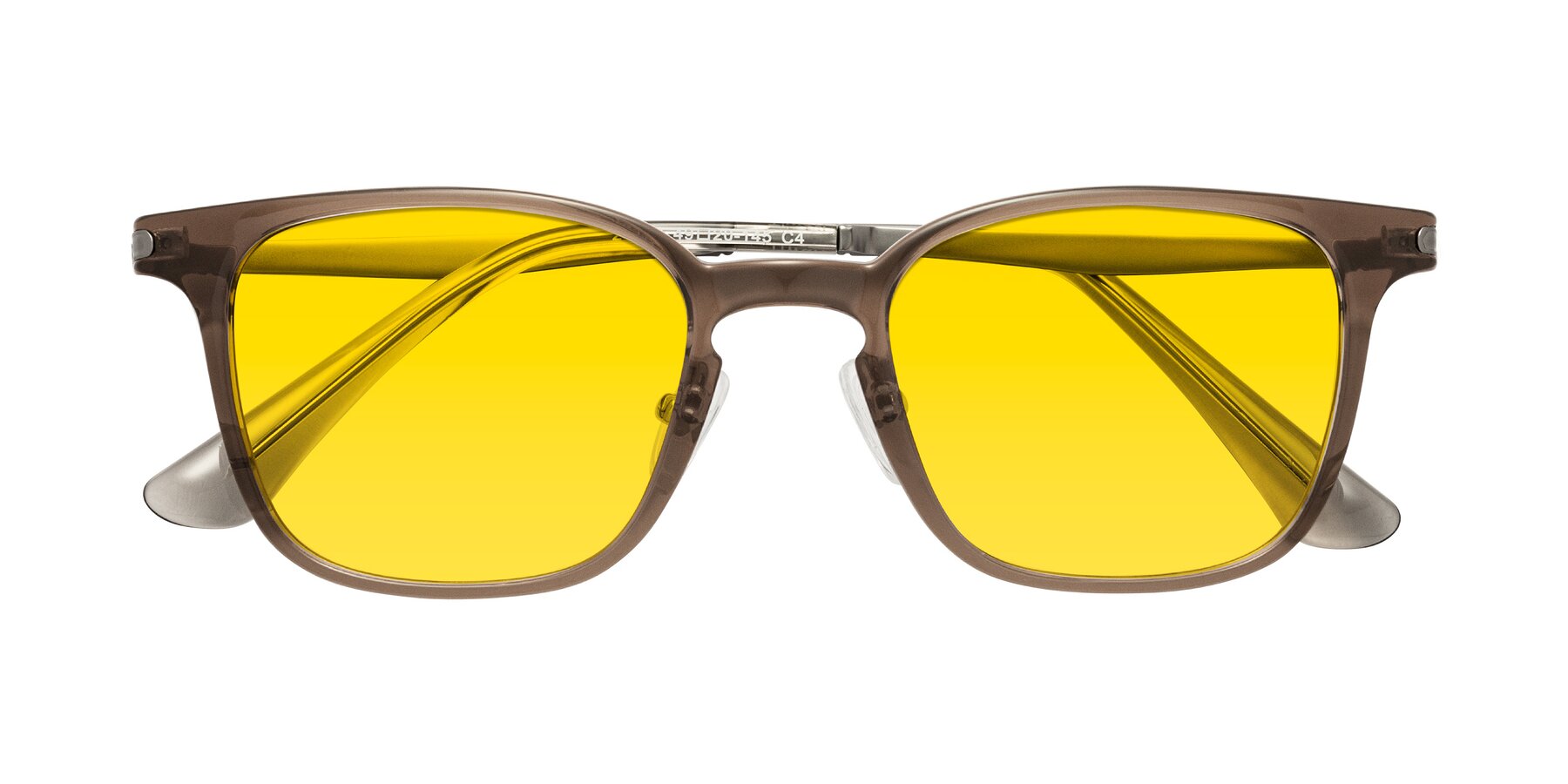 Folded Front of Tiwari in Brown with Yellow Tinted Lenses