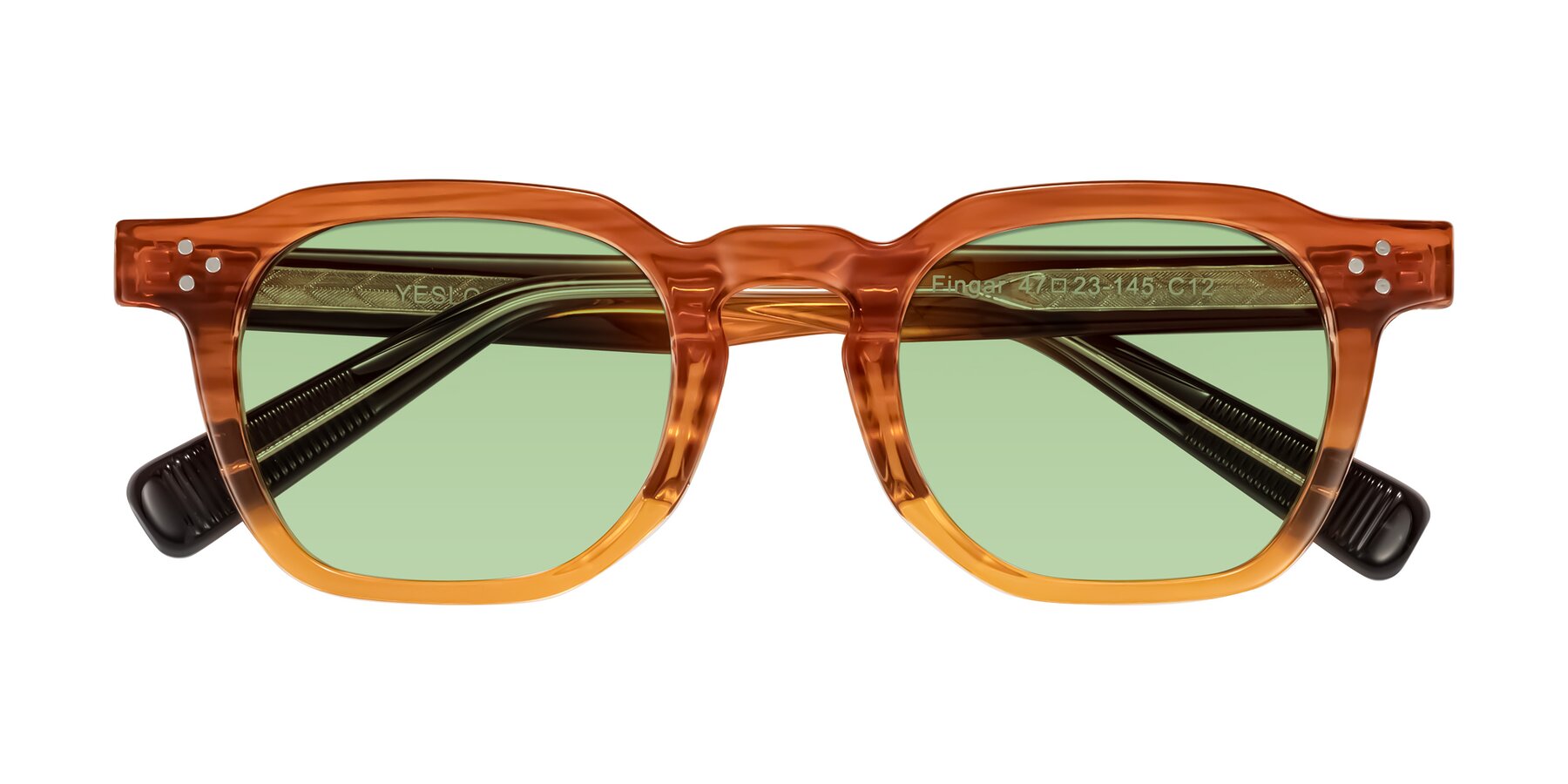 Folded Front of Fingar in Amber Striped with Medium Green Tinted Lenses