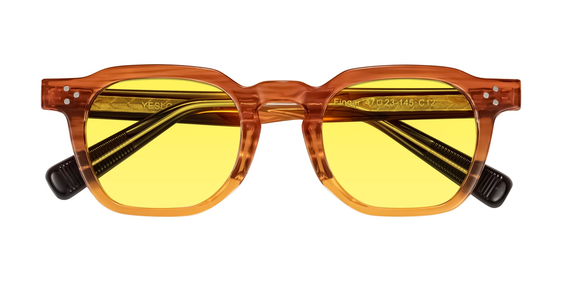 Folded Front of Fingar in Amber Striped with Medium Yellow Tinted Lenses