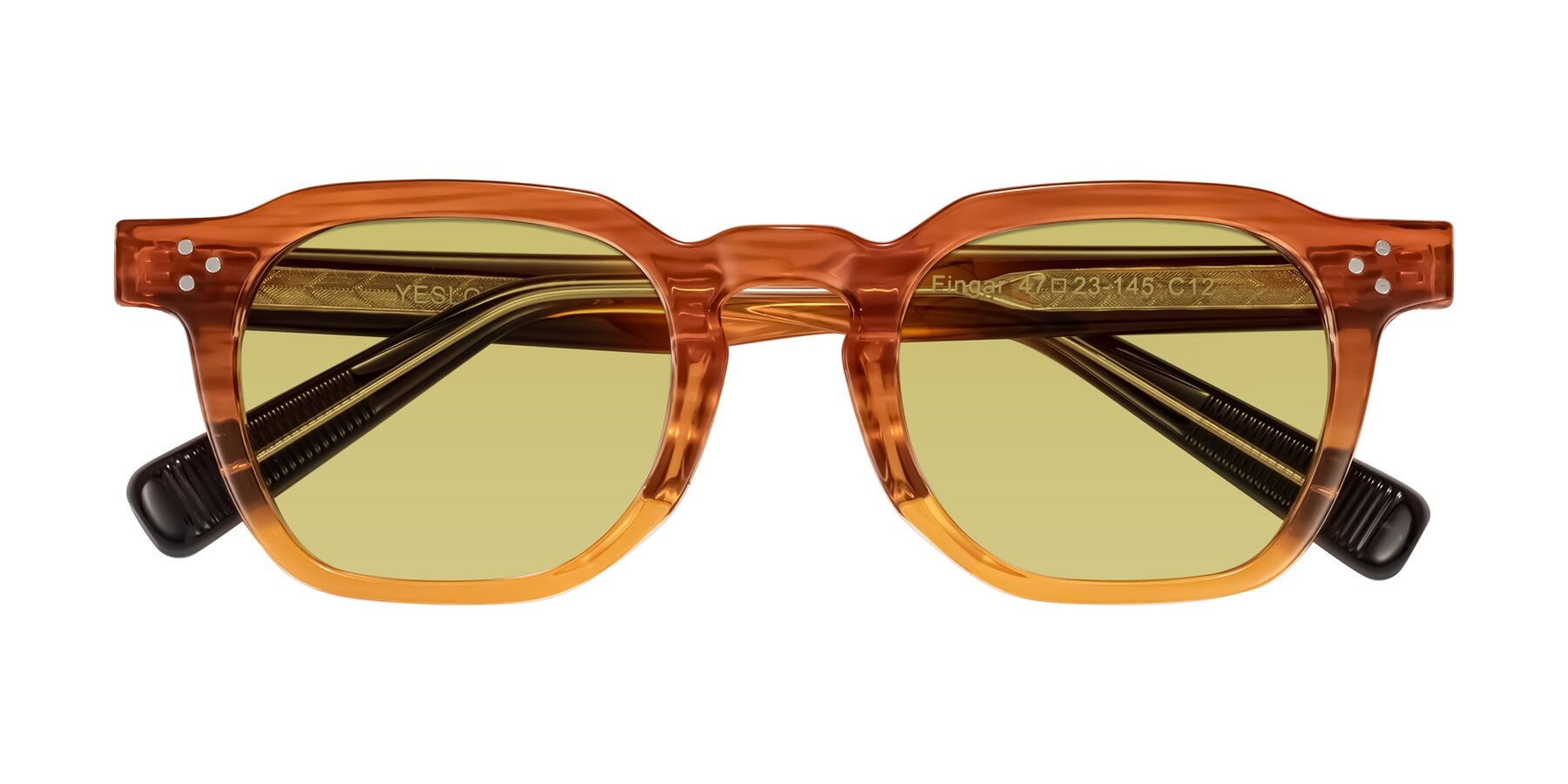 Folded Front of Fingar in Amber Striped with Medium Champagne Tinted Lenses