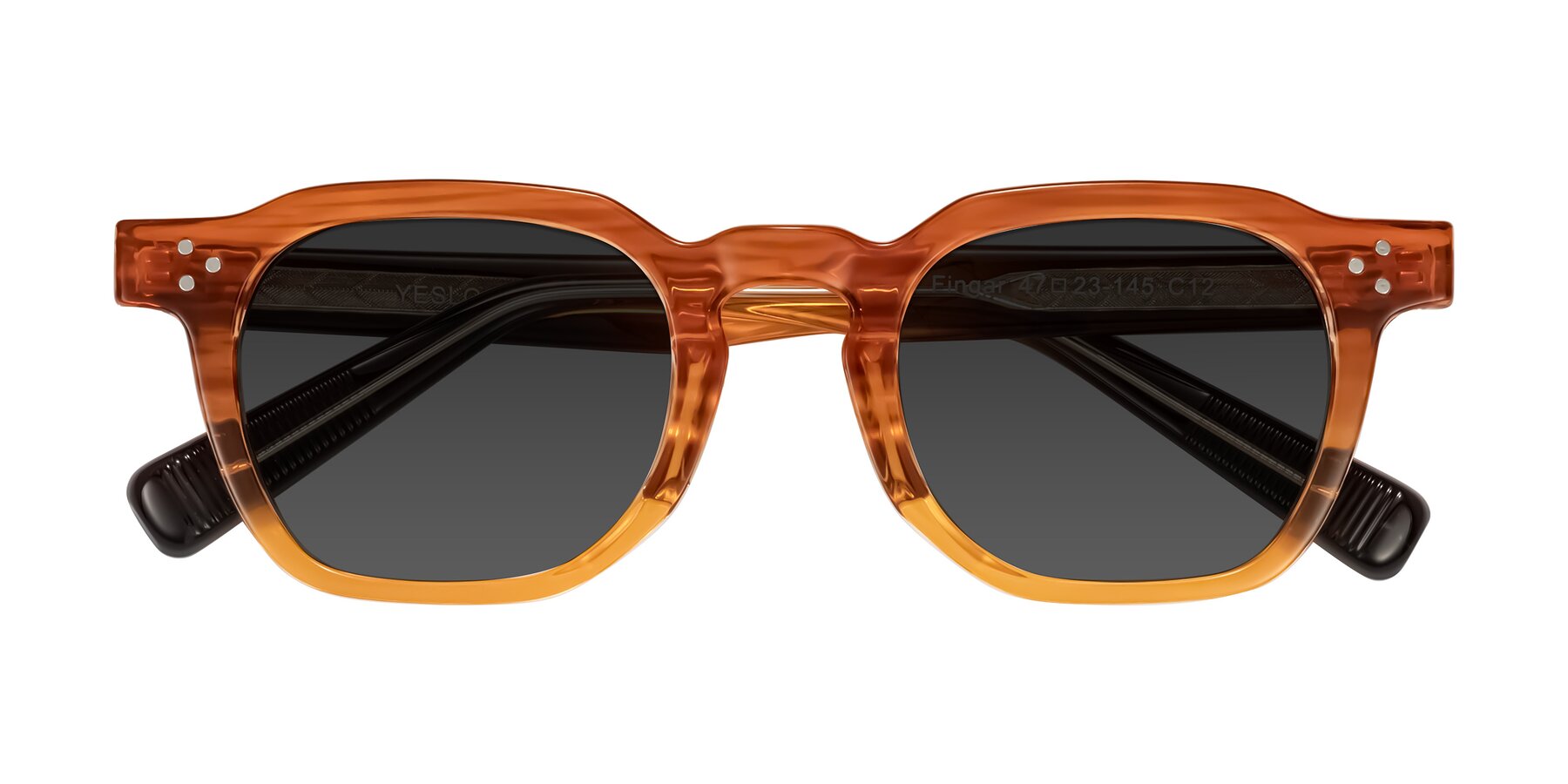 Folded Front of Fingar in Amber Striped with Gray Tinted Lenses