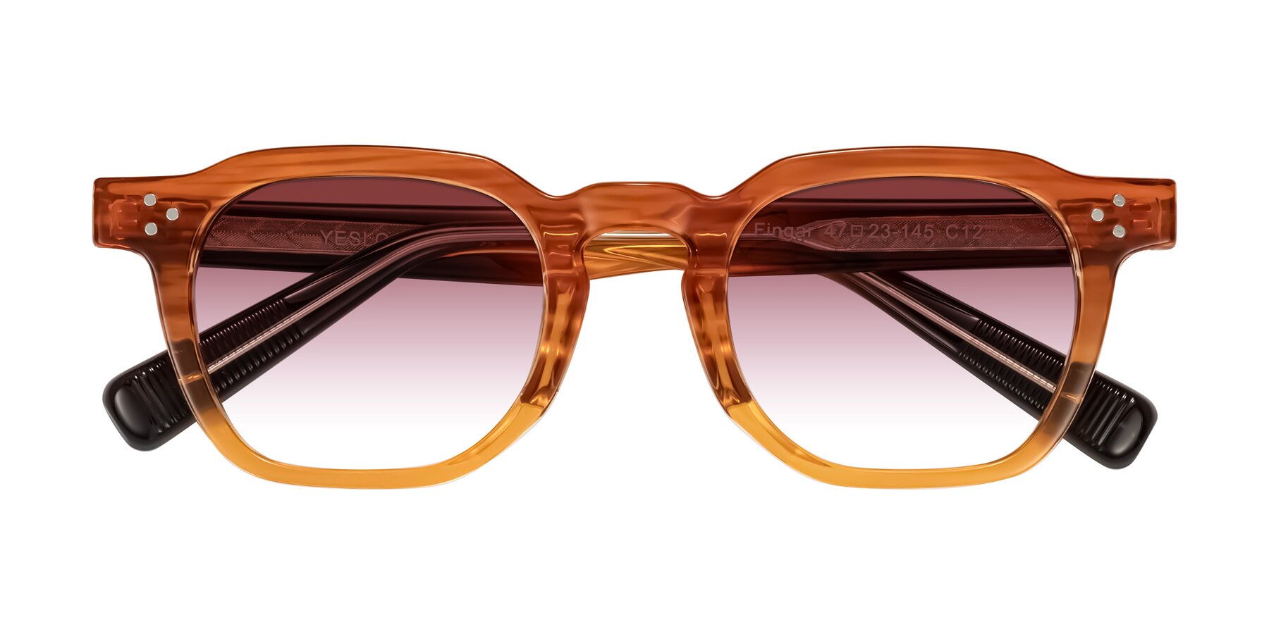Folded Front of Fingar in Amber Striped with Garnet Gradient Lenses