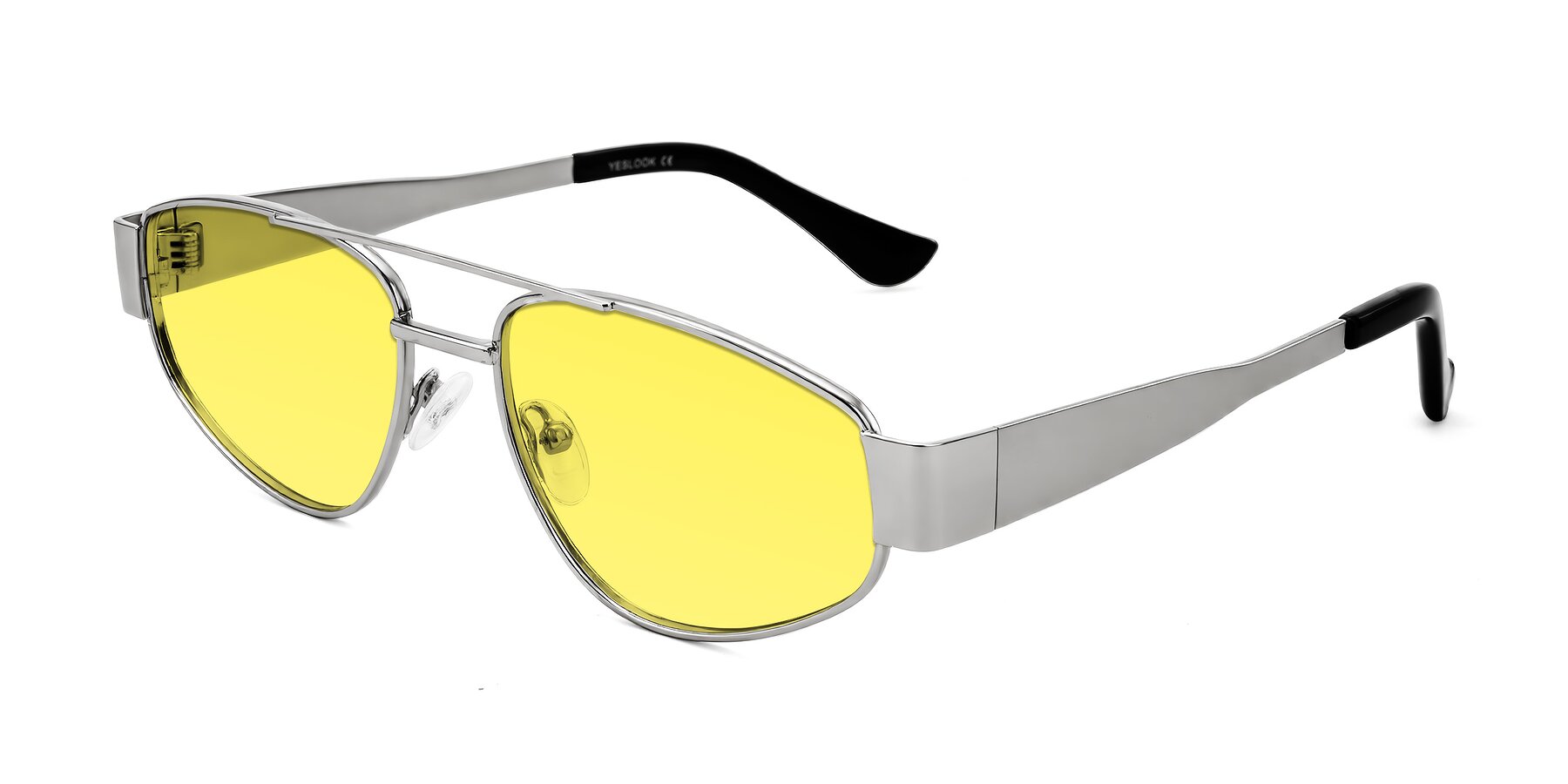 Angle of Runoz in Silver with Medium Yellow Tinted Lenses