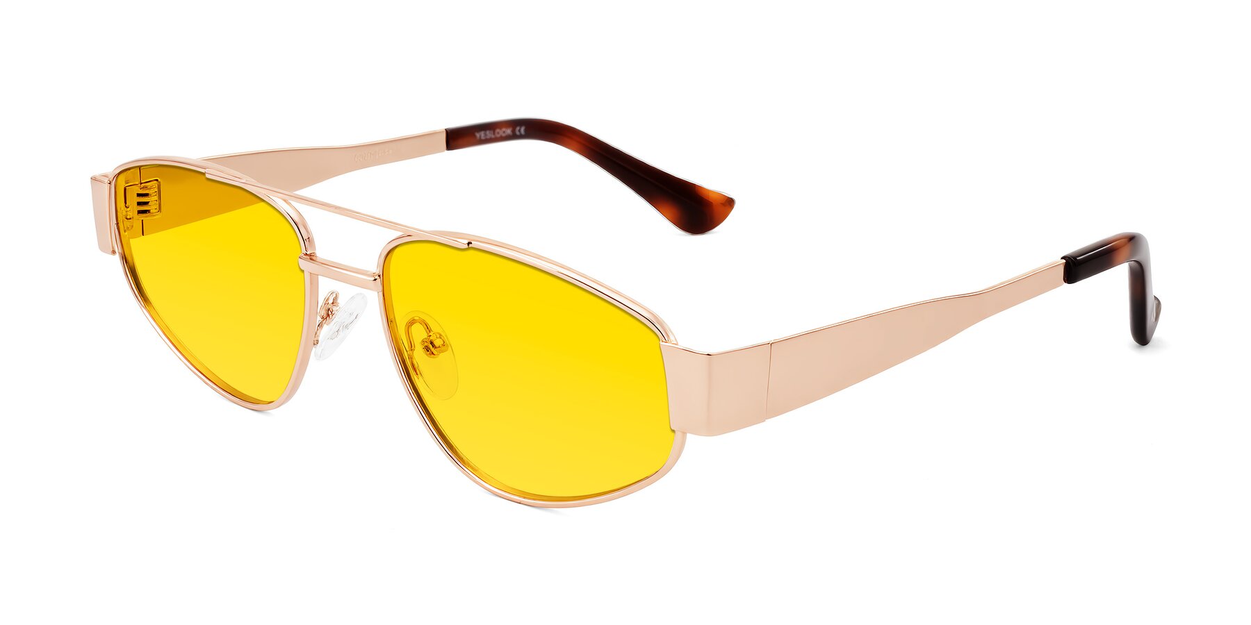 Angle of Runoz in Rose Gold with Yellow Tinted Lenses
