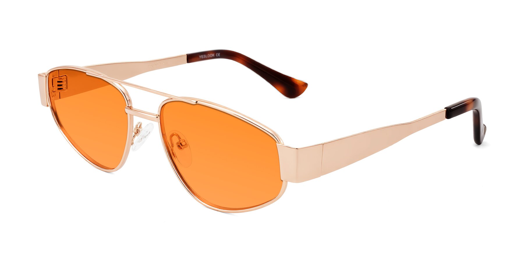 Angle of Runoz in Rose Gold with Orange Tinted Lenses