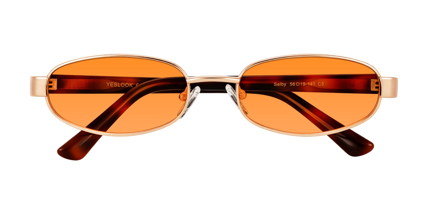 Folded Front of Selby in Rose Gold with Orange Tinted Lenses